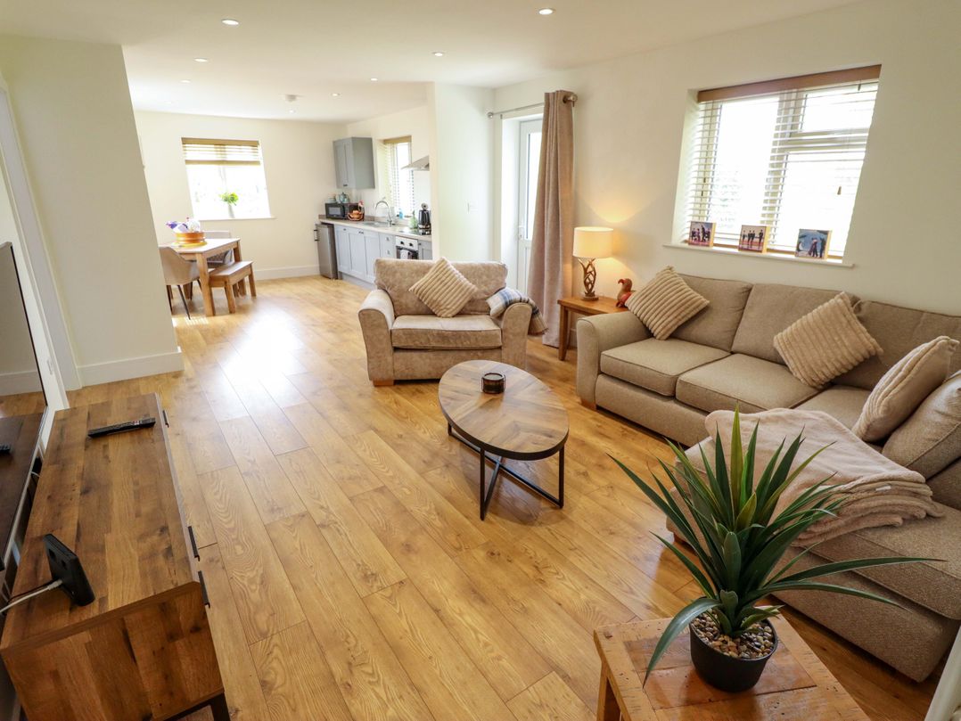 A living room with a sofa and coffee table at The New Build in South Reston near Louth