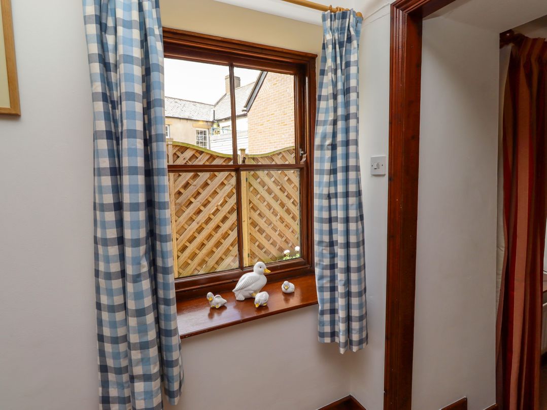 A window with decorative objects on the sill at Lavender Cottage (Bailiffgate) Alnwick