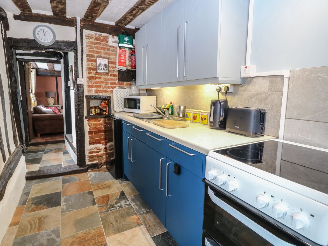 A kitchen with various appliances at Driftway Stables Retreat in Diss