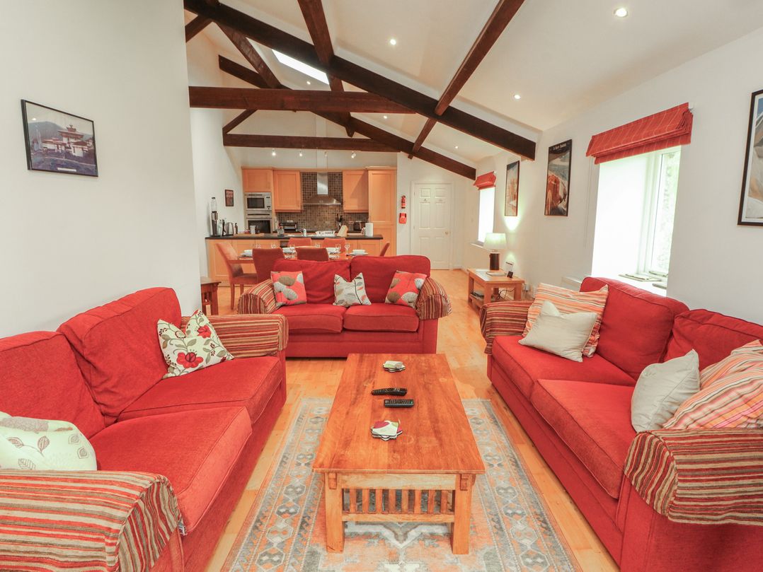 A living room with sofas and a coffee table at Winster Fields, Cartmel Fell near Windermere