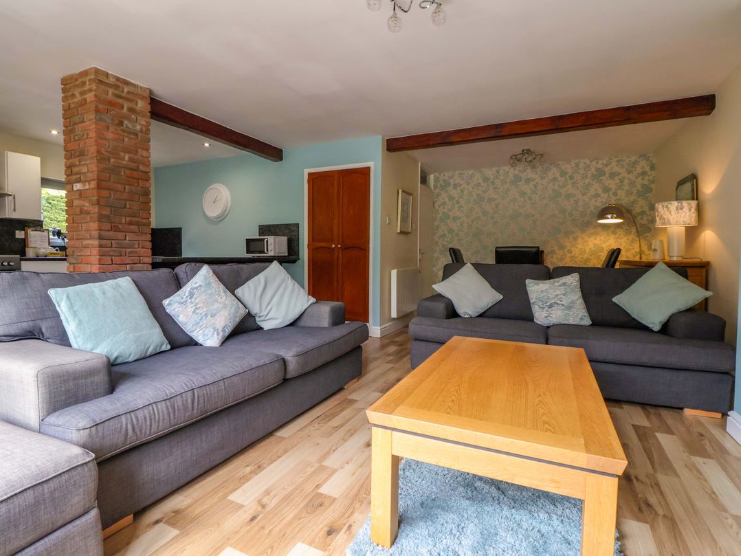 A living room with sofas and a coffee table at The Granary in York