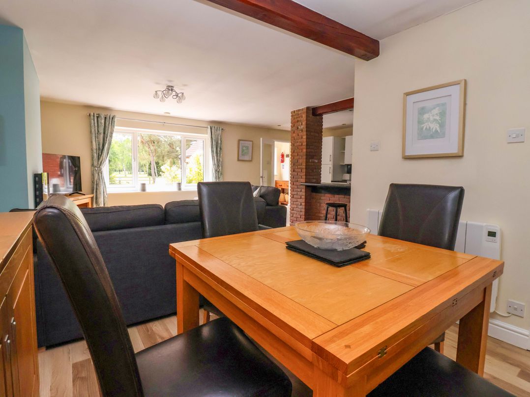 A dining room with a table and chairs at The Granary in York