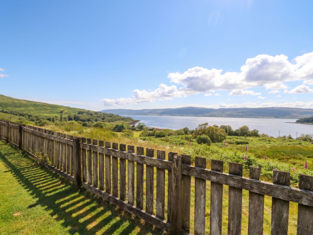 An outdoor view of water and mountains at Starfish Cottage, Craignure, Isle Of Mull