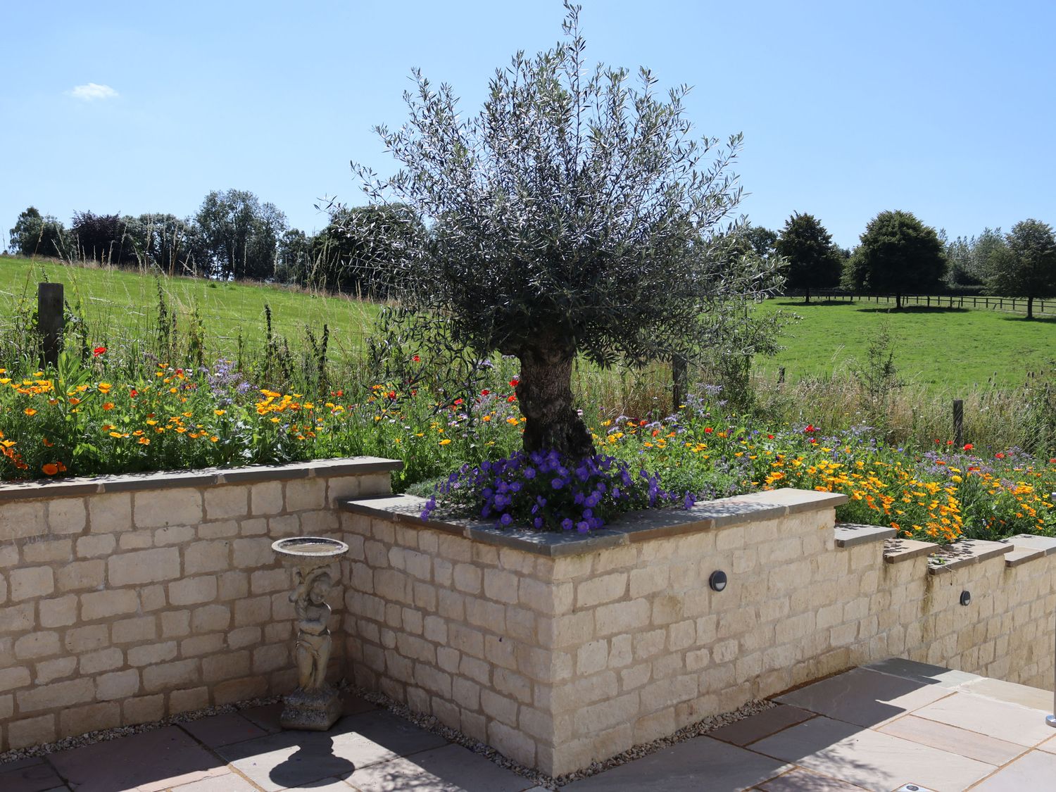 Leafield House in Upper Seagry, Wiltshire. Hot tub. Cinema room. Library. Freestanding bath. Luxury.