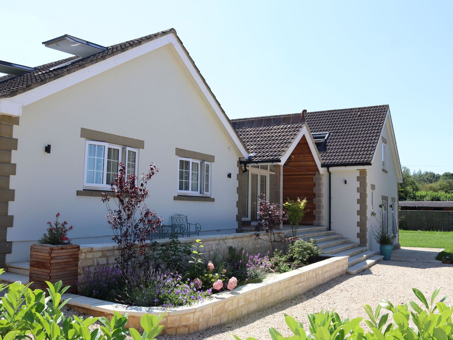 Leafield House in Upper Seagry, Wiltshire. Hot tub. Cinema room. Library. Freestanding bath. Luxury.