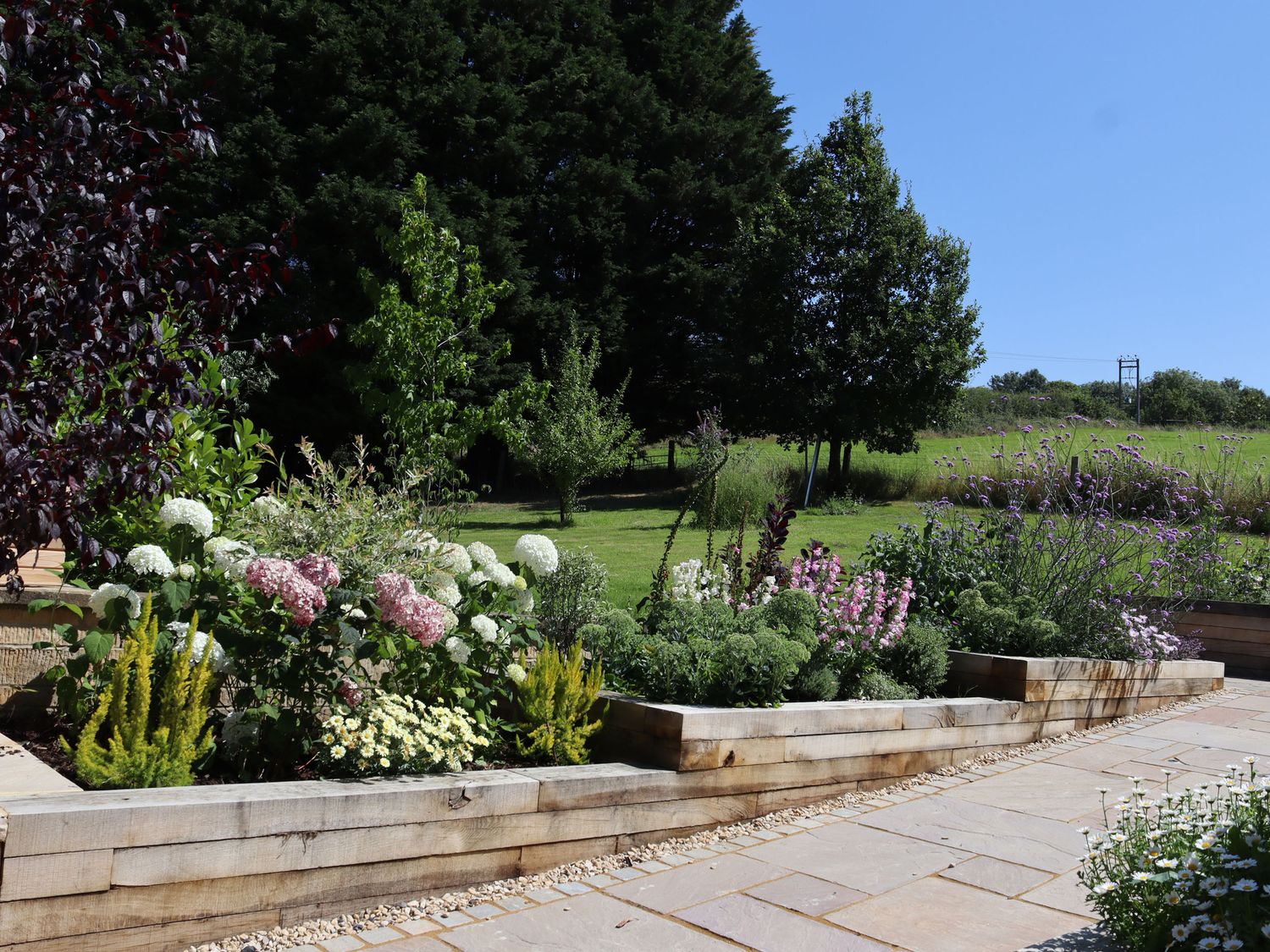 Leafield House in Upper Seagry, Wiltshire. Hot tub. Cinema room. Library. Freestanding bath. Luxury.