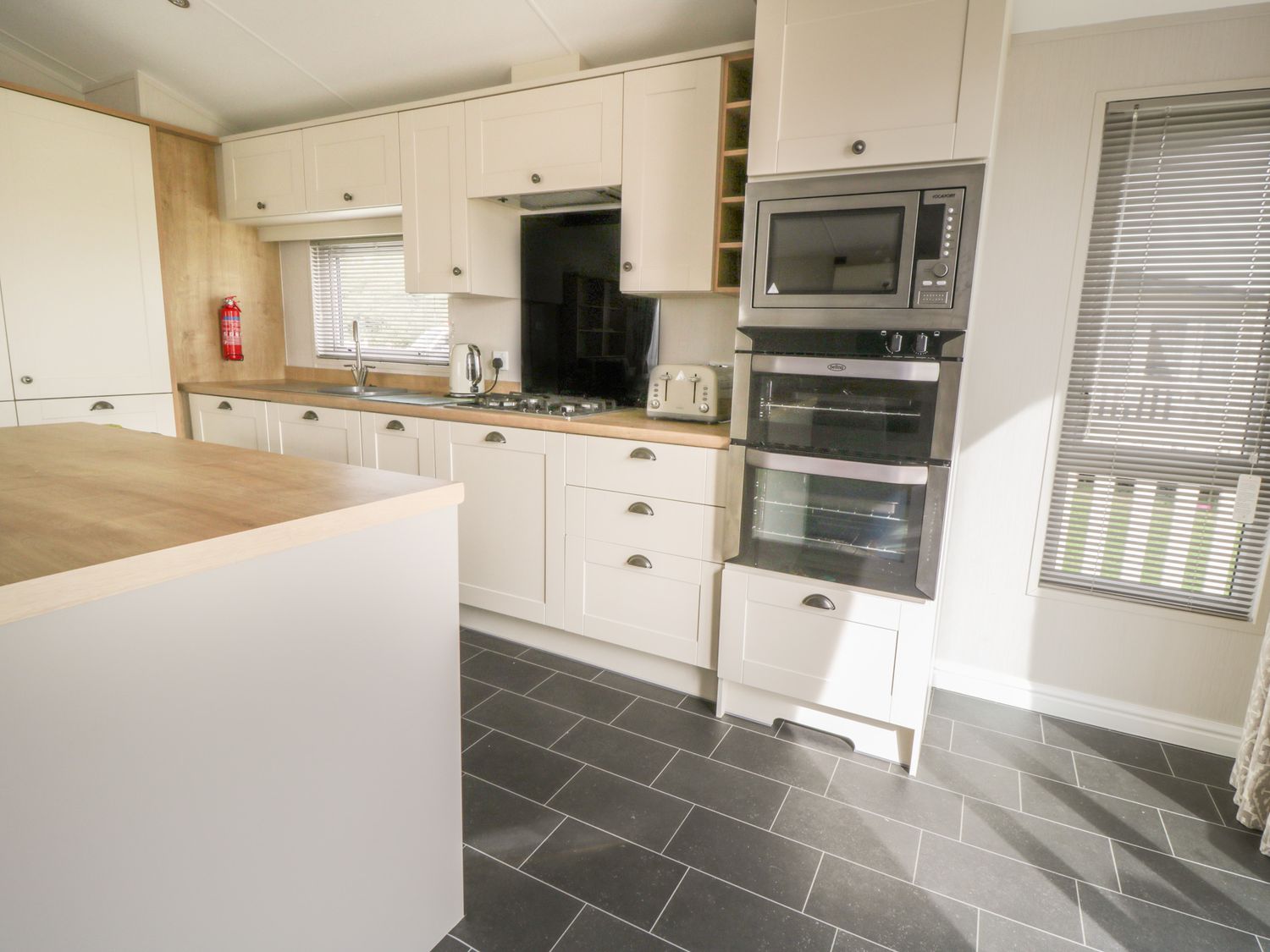 Kitchen area in Daisy Lodge ( Ref 1055603 ) Holiday Park at Cayton Bay North Yorkshire