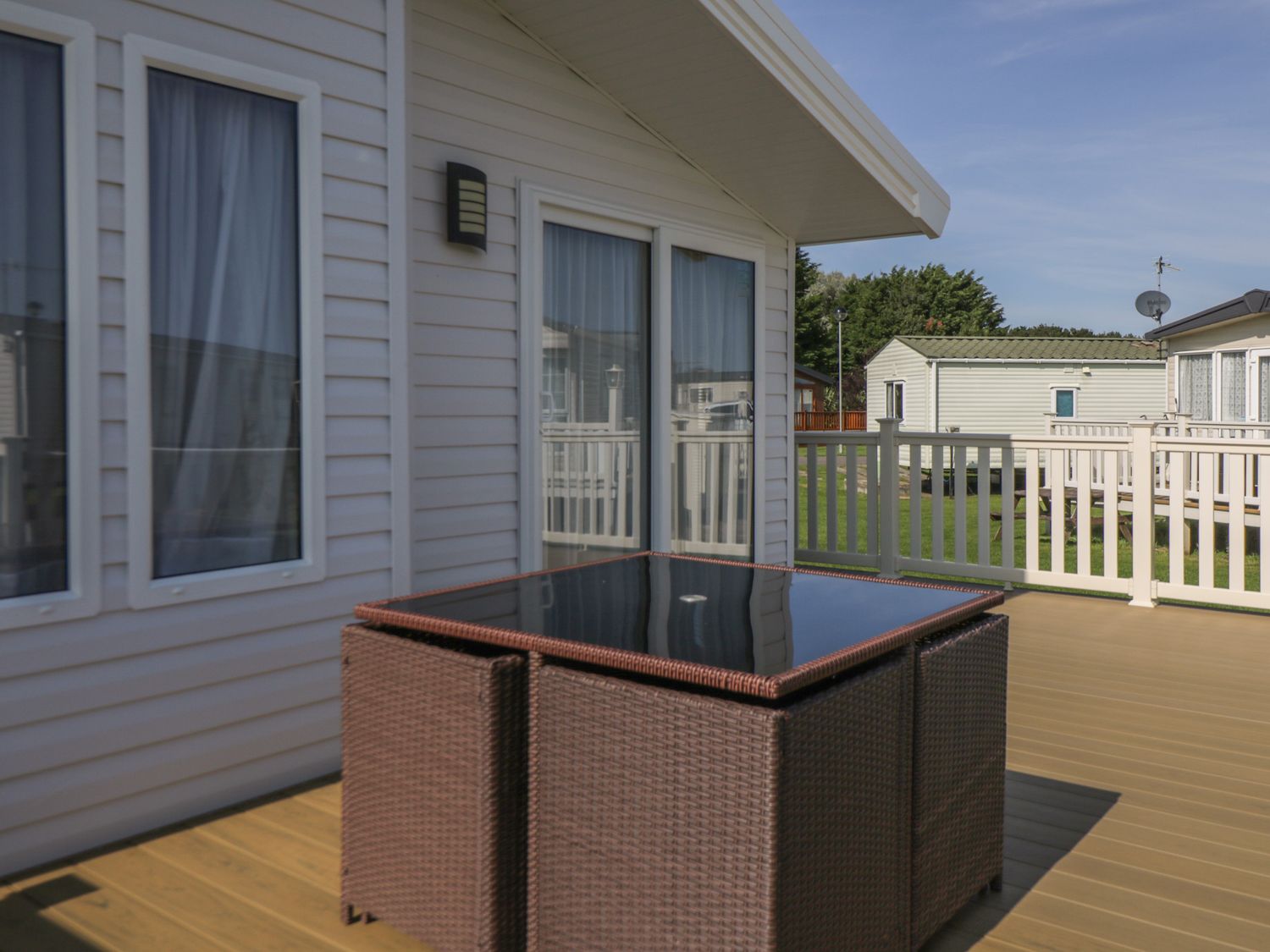 Daisy Lodge decking area ( Ref 1055603 ) Cayton Bay Holiday Lodge near Scarborough North Yorkshire