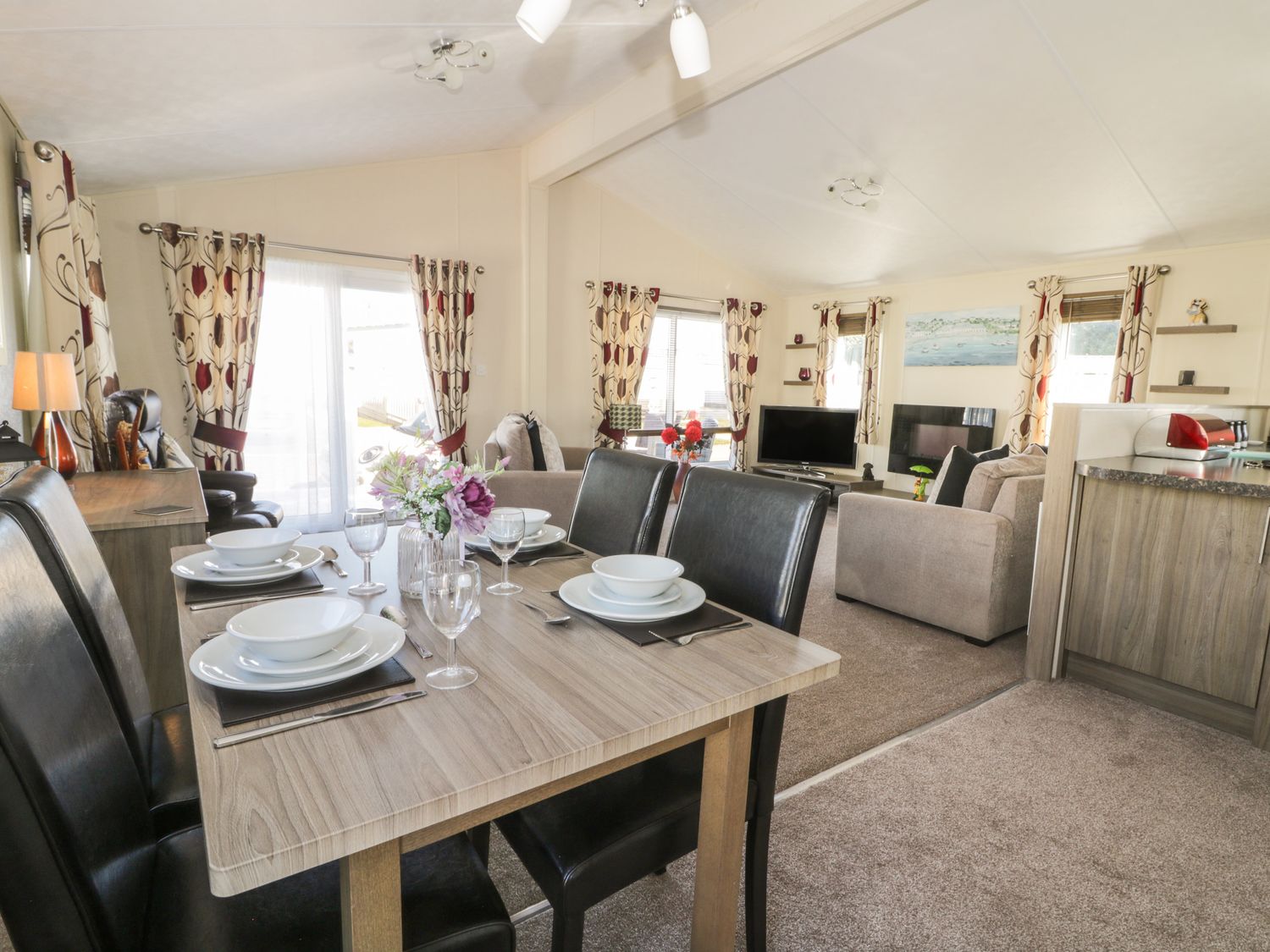 Open plan interior at Two Little Ducks Lodge ( Ref 1059418 ) Holiday Accommodation at Cayton Bay North Yorkshire