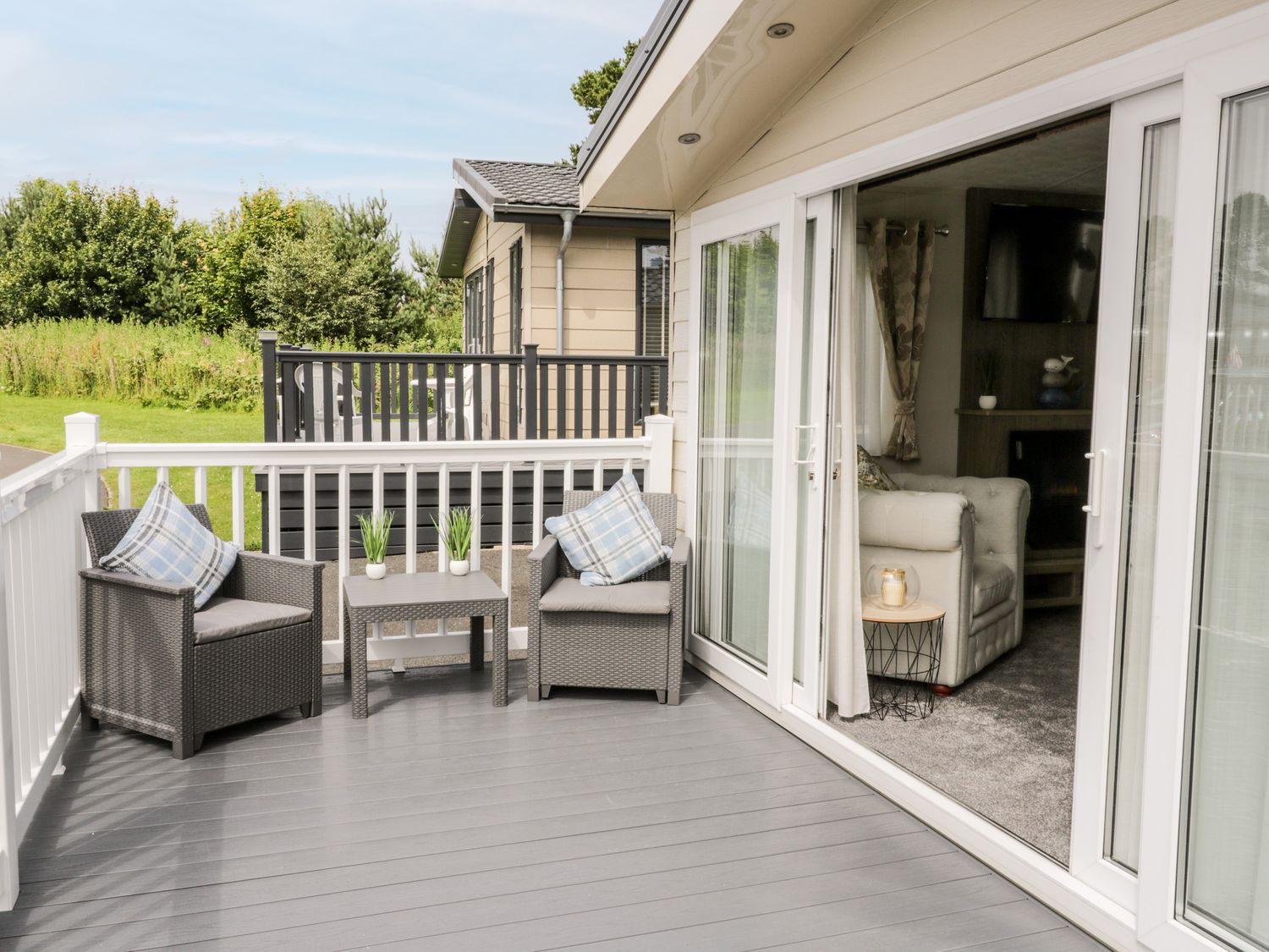 Decking area Decking area at The Rodley Pines Holiday Lodge ( Ref 1076839 ) Cayton Bay Accommodation near Scarborough North Yorkshire