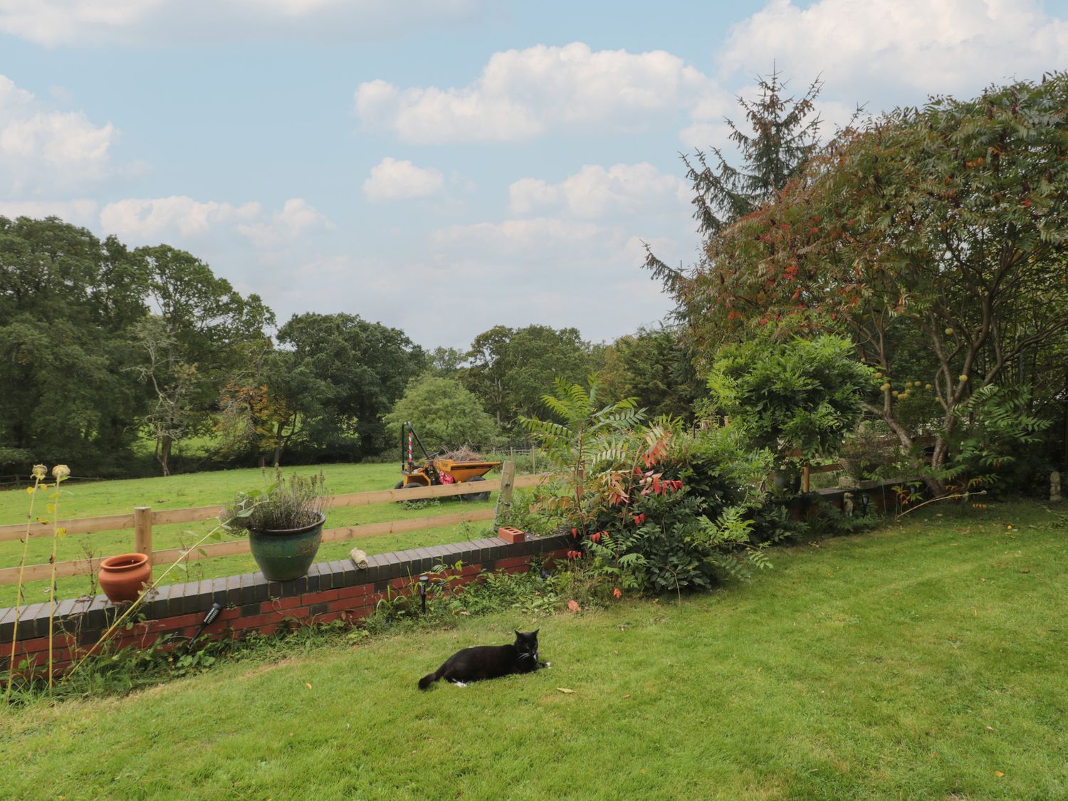 Brook Farm, rests near Ringwood, Hampshire. Four-bedroom home set rurally. Woodburning stove. Large.