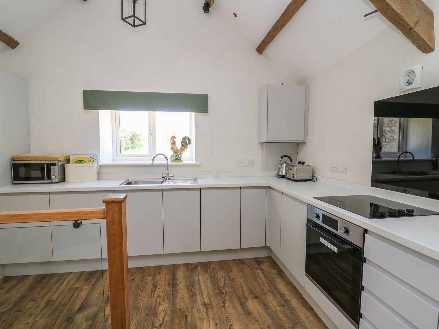The Parlour near Cardigan, Ceredigion. Ideal for couples. Pet-friendly. Woodfired hot tub. Open-plan