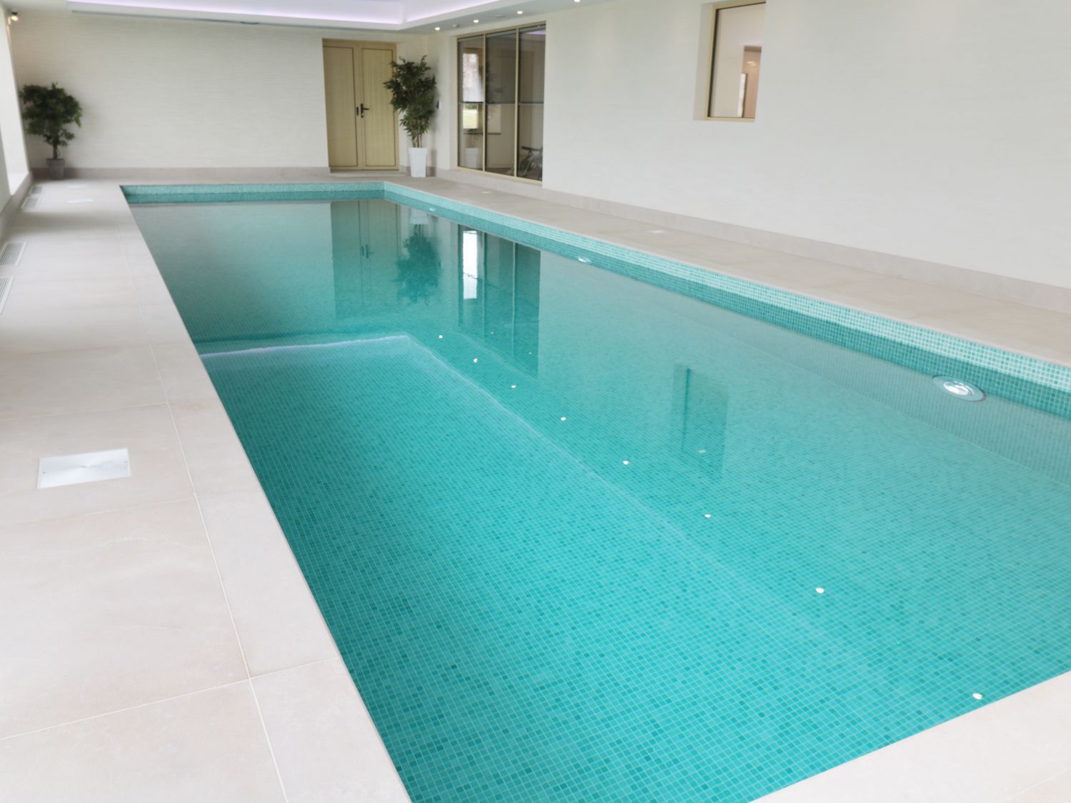 Byre Cottage in Embleton, Northumberland. Single-storey. Child-friendly. Spacious patio with hot tub