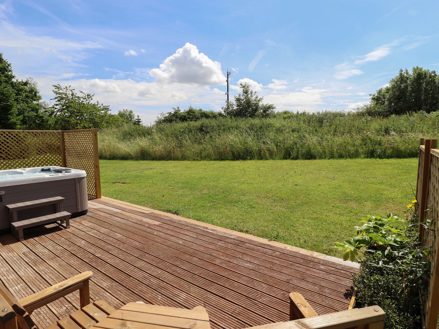 Lodge 1, South Hykeham, Lincolnshire, off-road parking, private front decking with hot tub, Smart TV