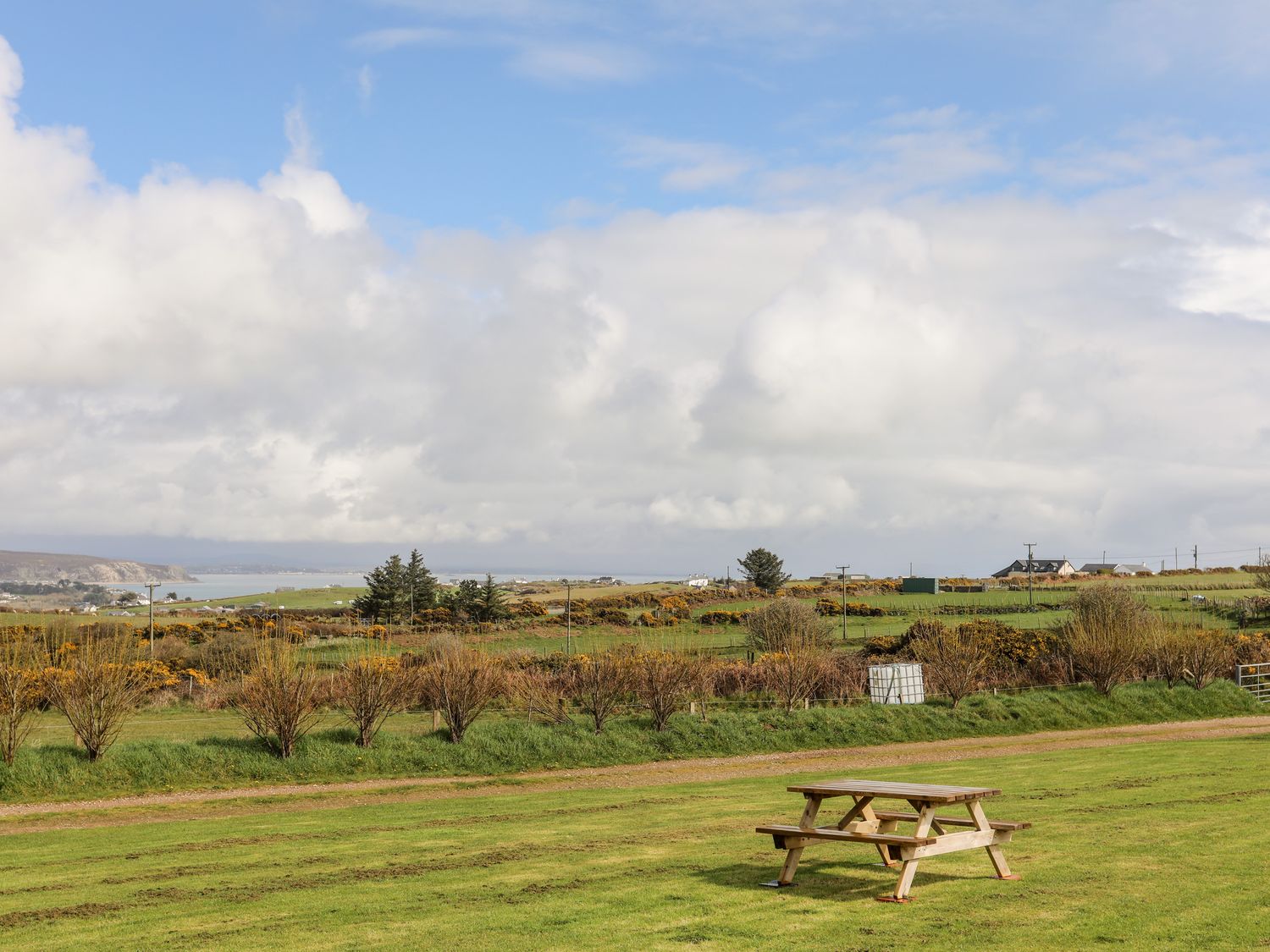 Cowshed in Abersoch, Gwynedd. One bedroom sleeping two guests. Enclosed garden, one pet, near beach.