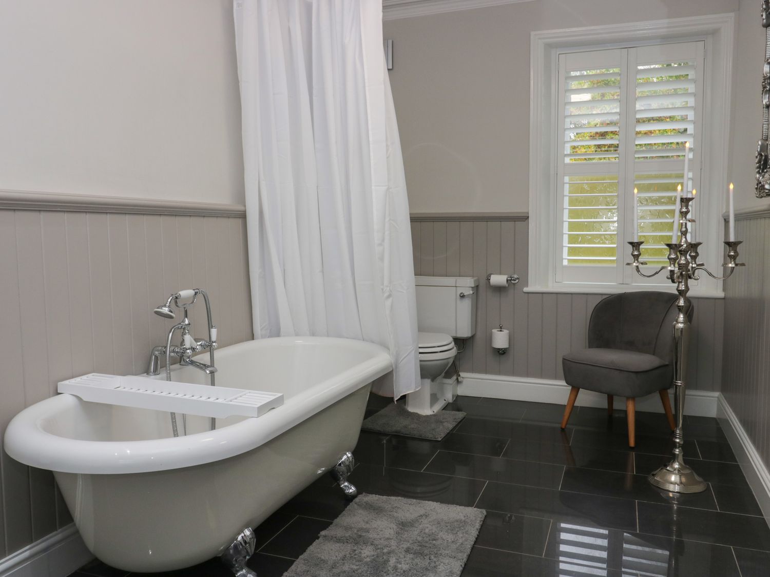 Beechgrove Manor in Workington, Cumbria. Hot tub. Woodburning stove. Near coast. Smart TV. En-suite.