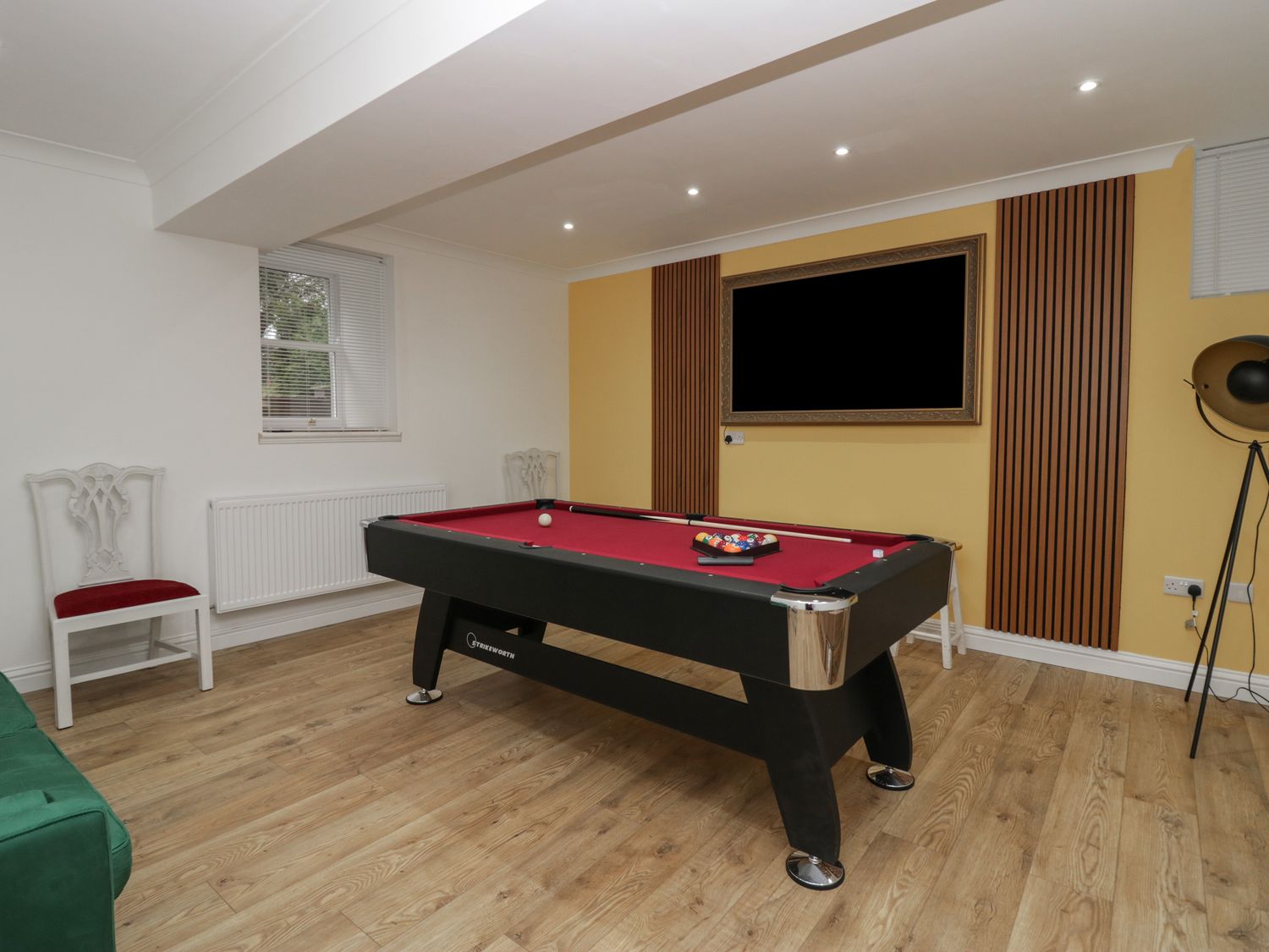 Beechgrove Manor in Workington, Cumbria. Hot tub. Woodburning stove. Near coast. Smart TV. En-suite.