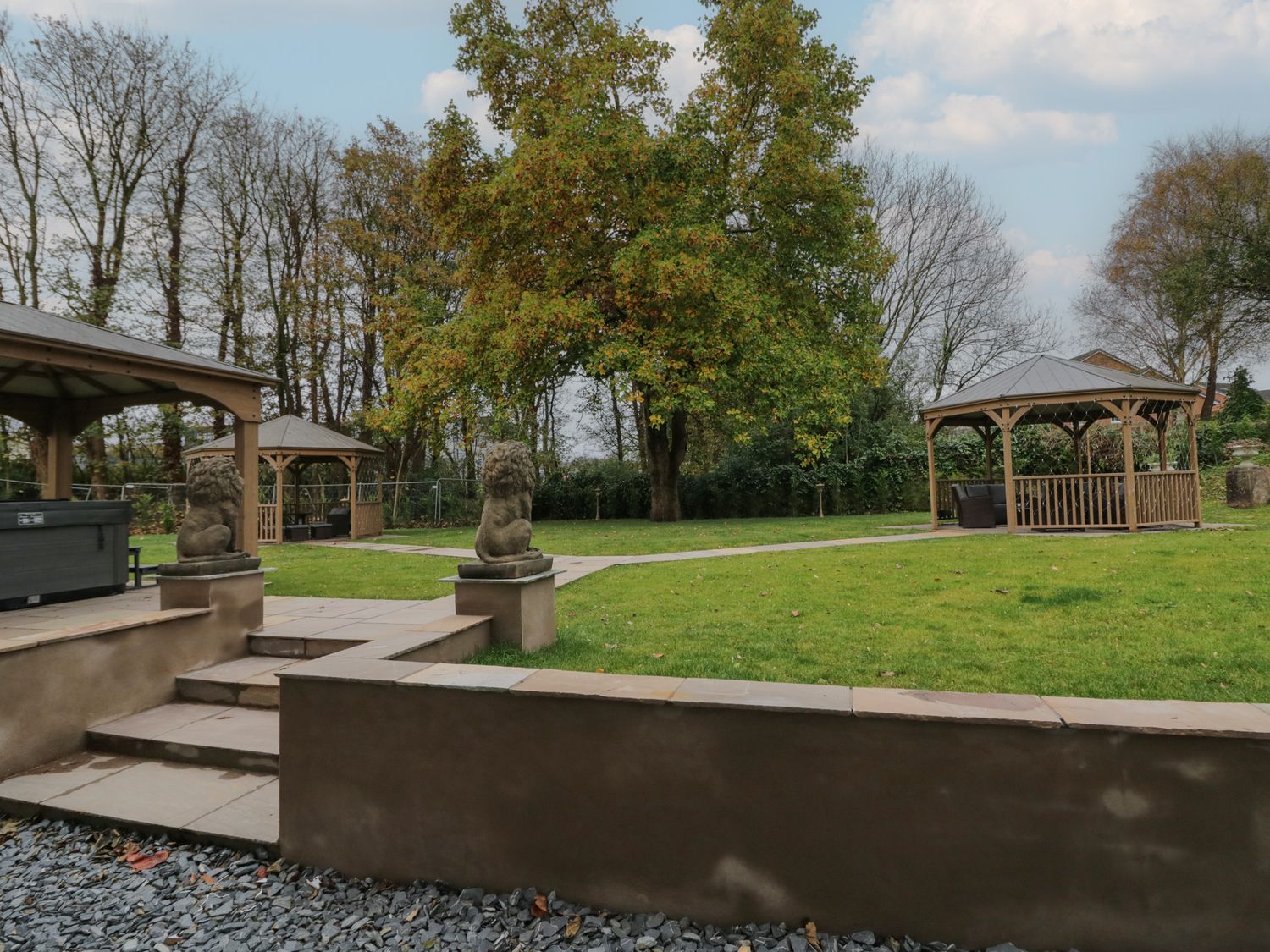 Beechgrove Manor in Workington, Cumbria. Hot tub. Woodburning stove. Near coast. Smart TV. En-suite.