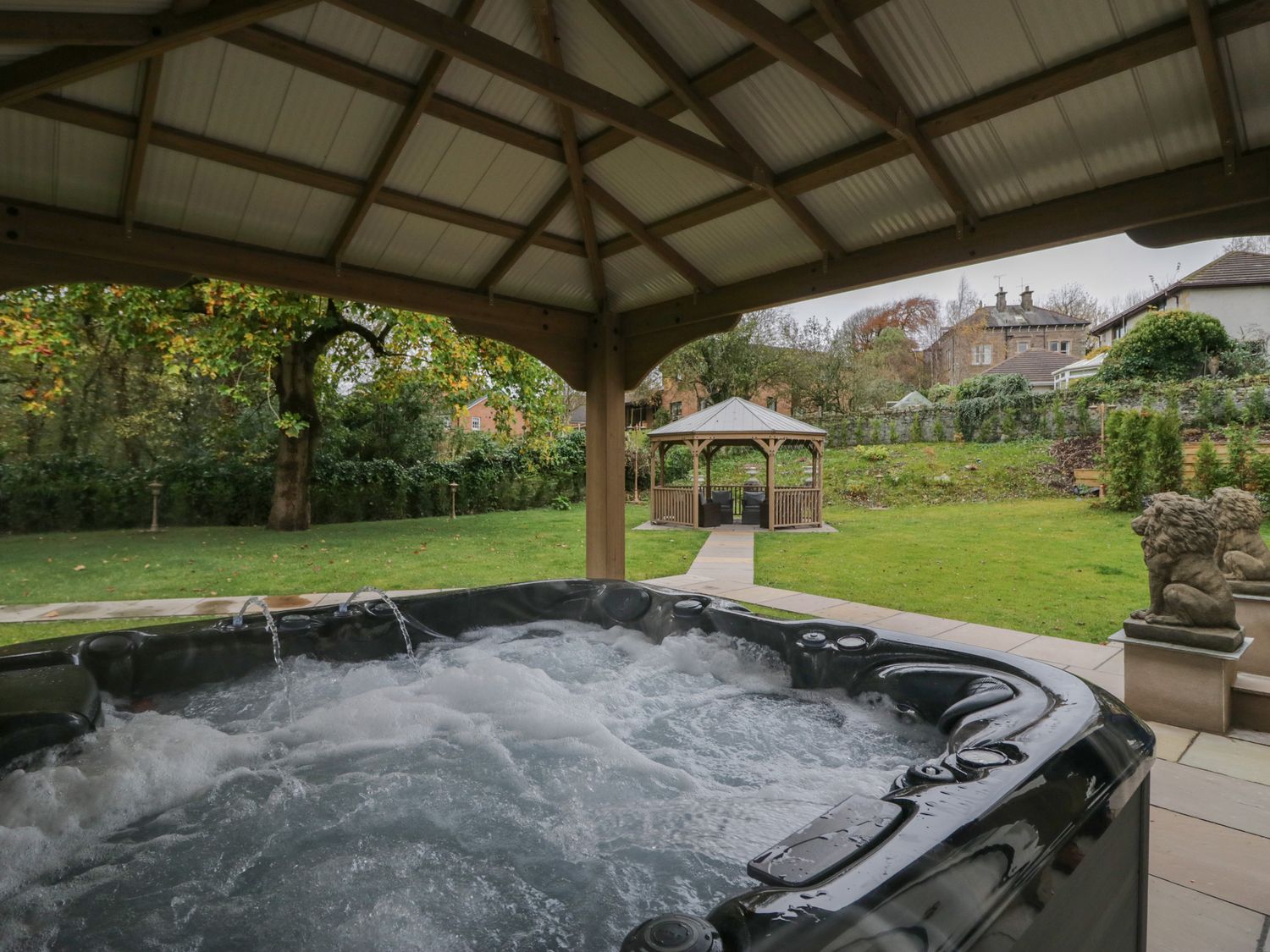 Beechgrove Manor in Workington, Cumbria. Hot tub. Woodburning stove. Near coast. Smart TV. En-suite.