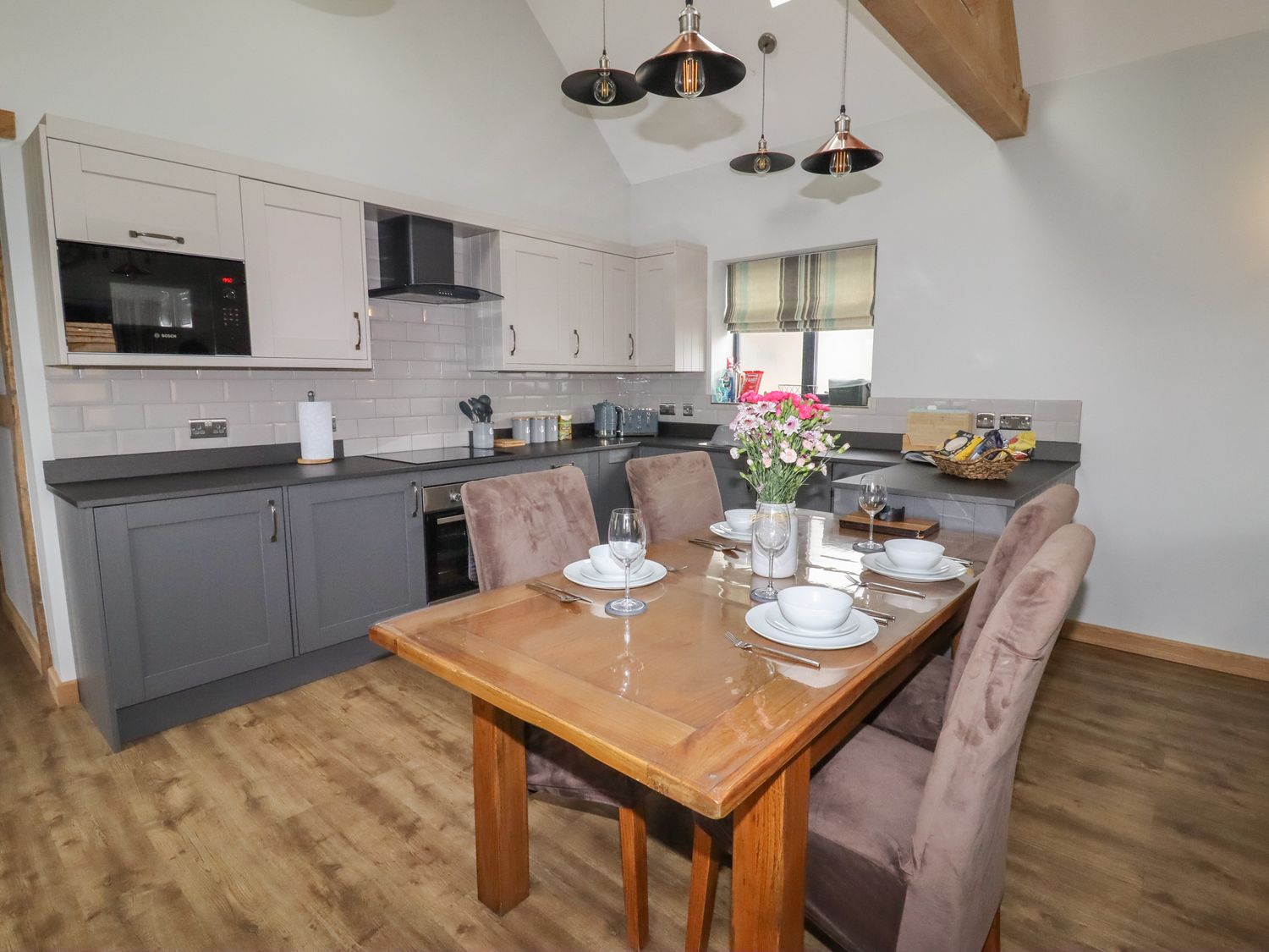 Forge Cottage is near Trefnant, Denbighshire. Two-bedroom barn conversion, resting rurally. Hot tub.