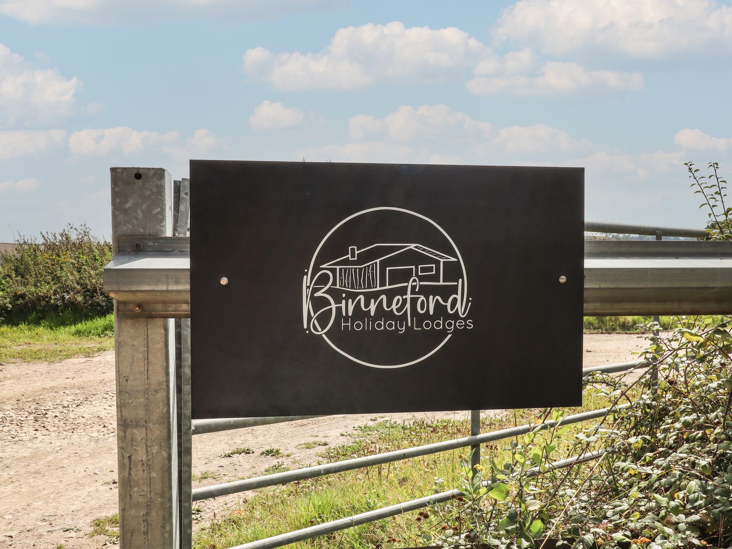 Primrose Lodge in Hittisleigh, Devon. Detached lodge. Open-plan living space with woodburning stove.