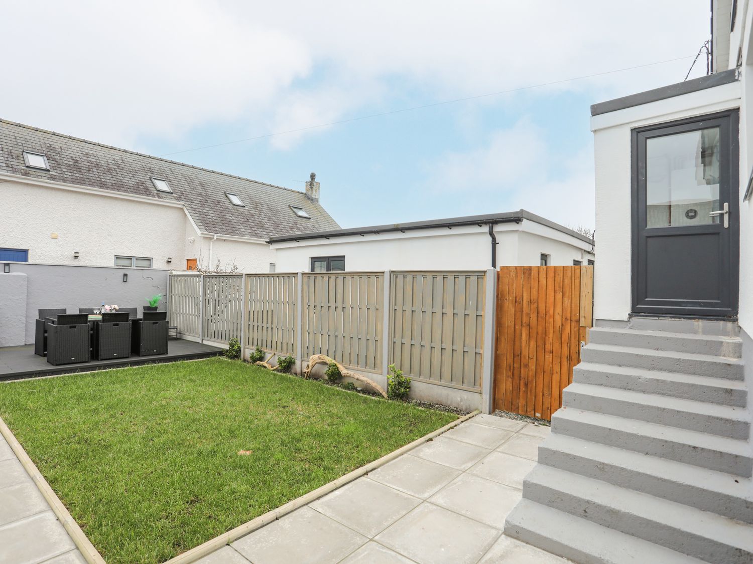 Clydfan, No 1 Trearddur Road in Trearddur Bay on the Isle of Anglesey. Pet-friendly cottage. Hot tub