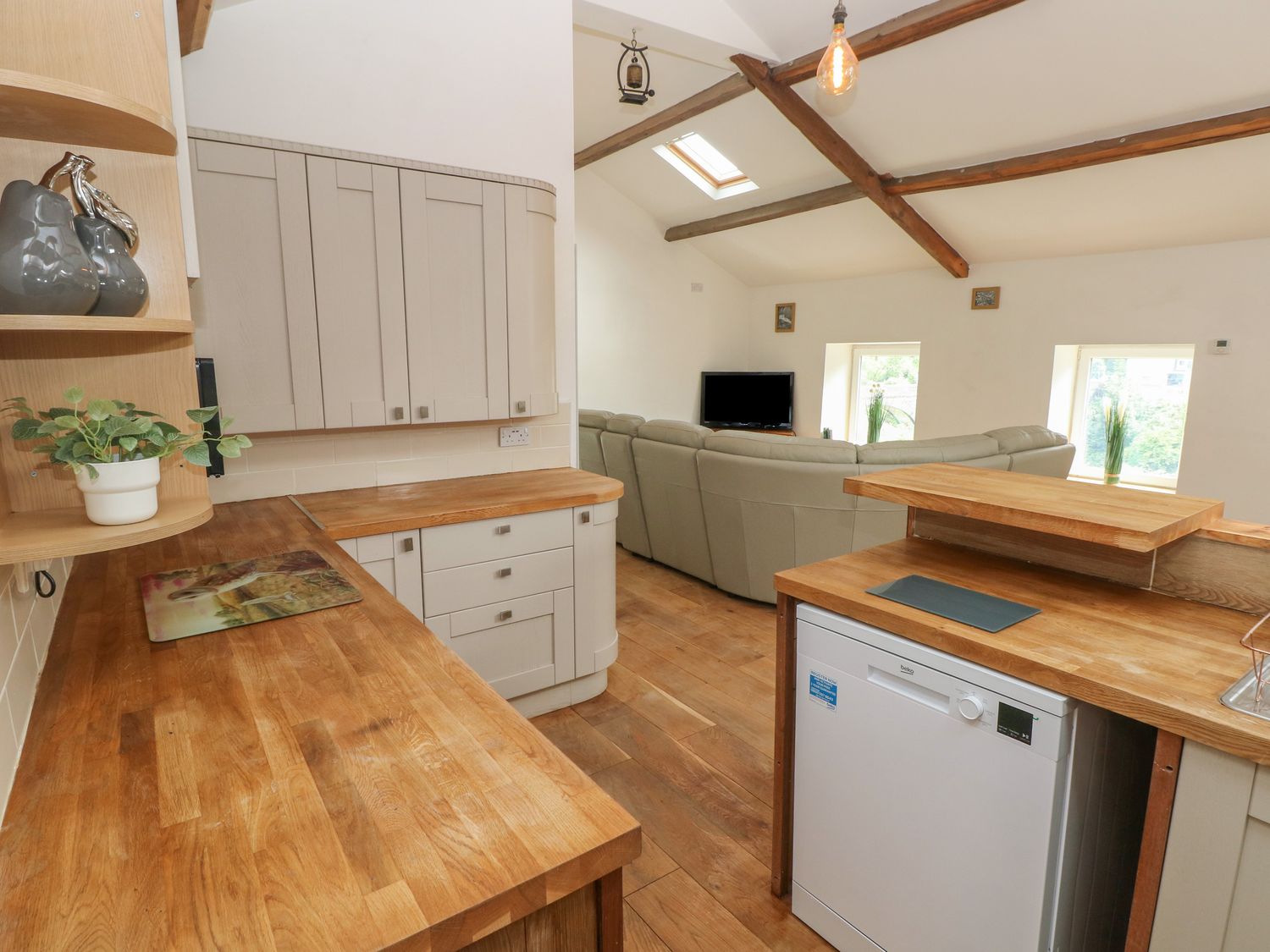 Greenheart Cottage, in Pontrhydyfen, West Glamorgan. Off-road parking. Close to river. Pet-friendly.