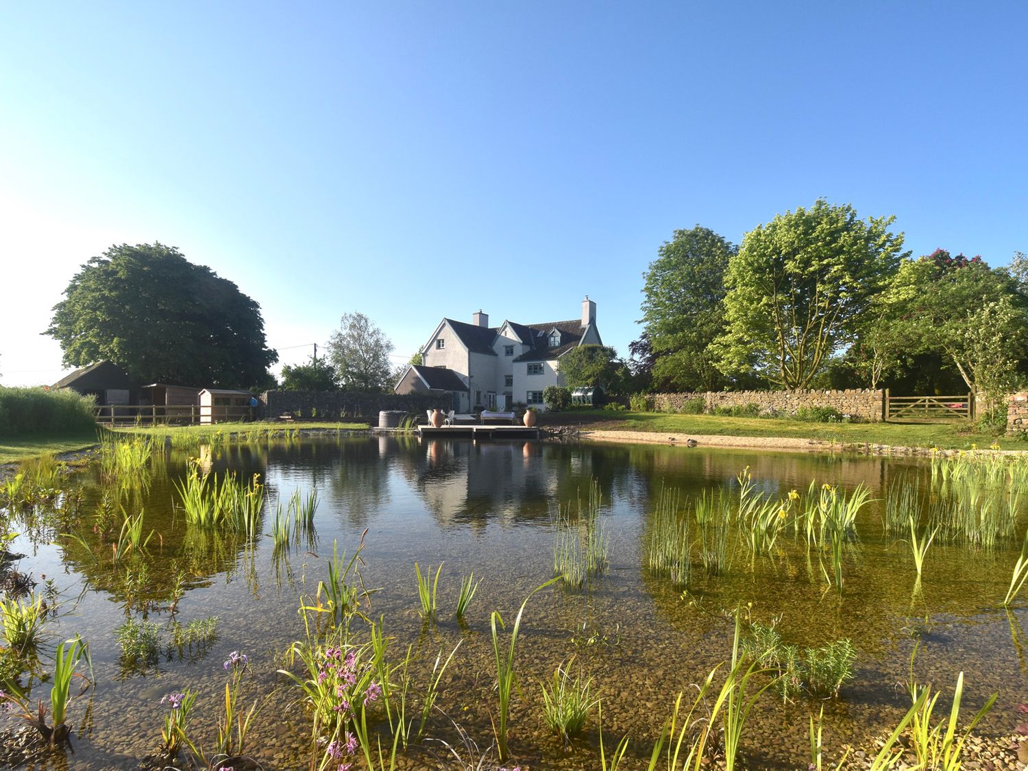 Manor Farm House is in Failand, Somerset. Four-bedroom home, with hot tub, private pond, and gardens