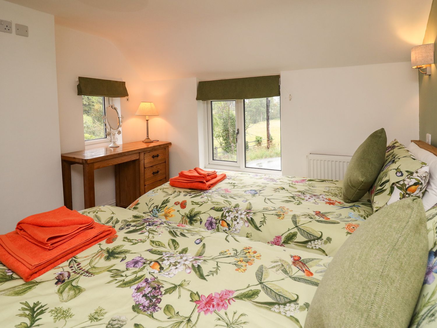 Min Y Nant is near Llangadfan, Powys. Three-bedroom cottage with riverside views. Wood-fired hot tub