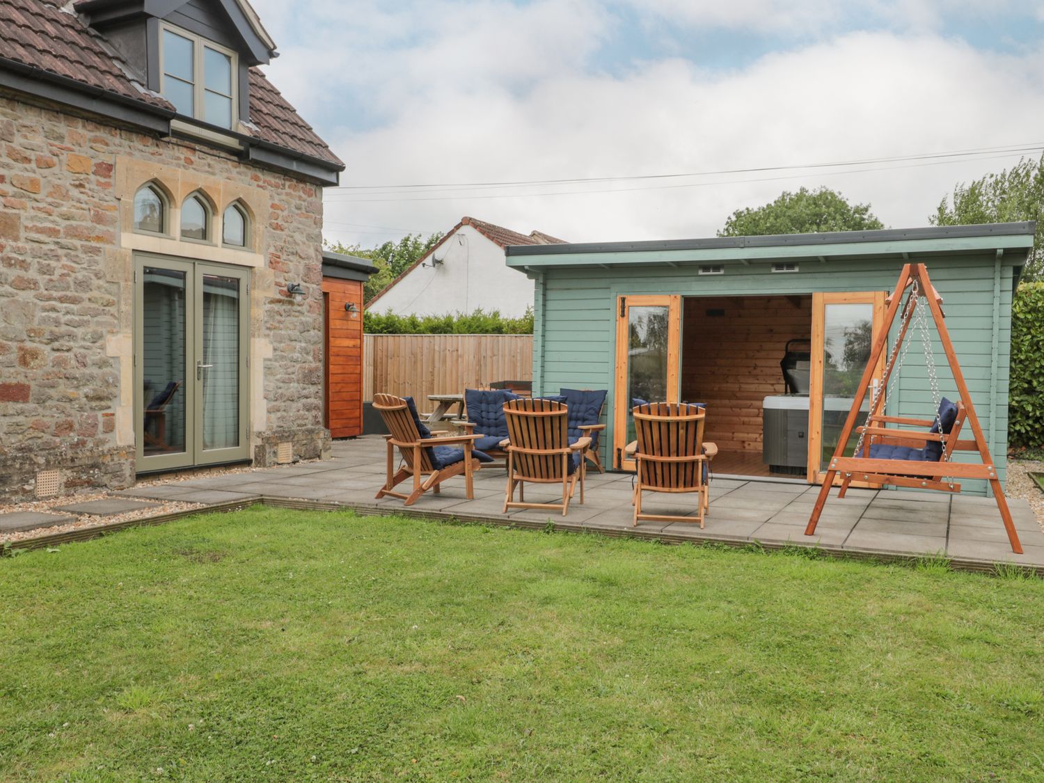 The Old Schoolrooms, in Holcombe, Somerset. Four-bedroom home with games room and hot tub. Pet-free.