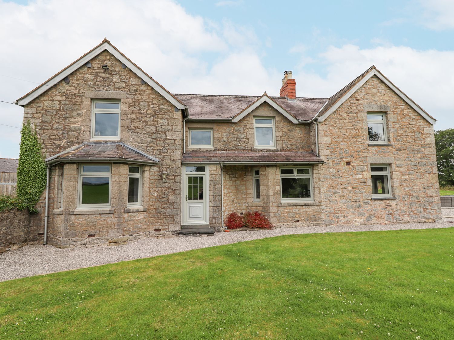 Segrwyd Uchaf in Denbigh, Denbighshire. Five-bedroom home with games room and EV charger. Near AONB.