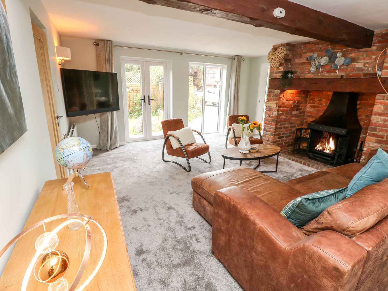 Northern Byre rests in Sopley, Hampshire. Four-bedroom barn conversion, resting near amenities. Pets