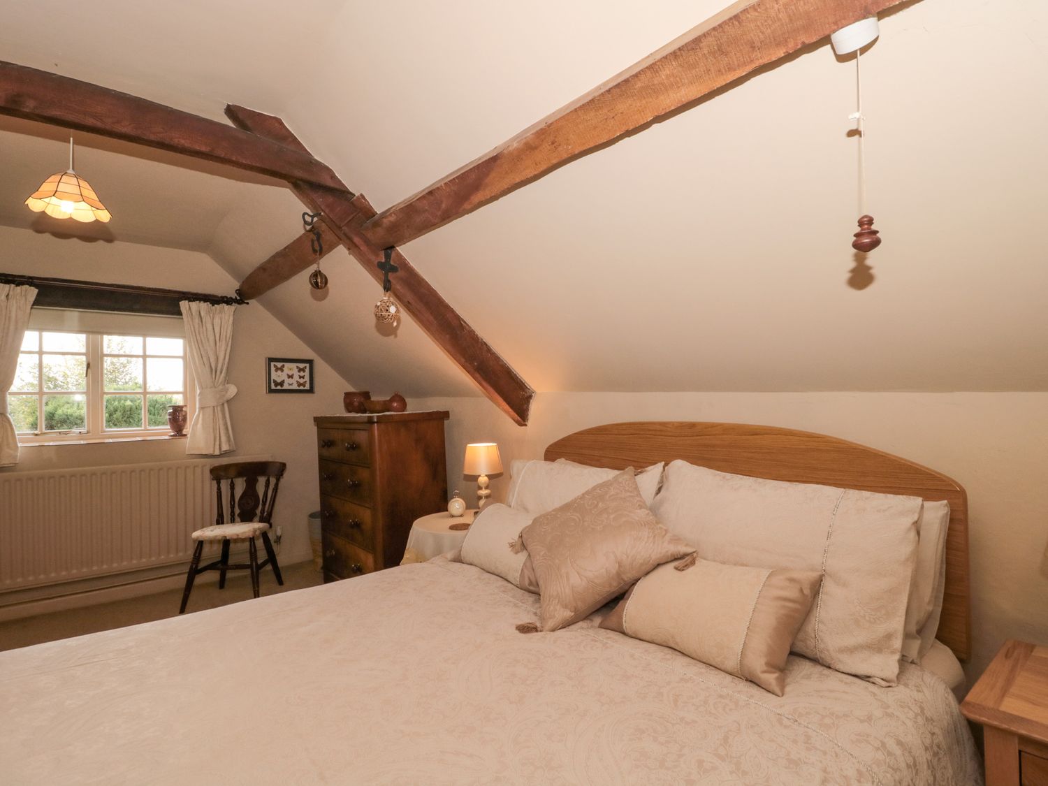 Elworth Farmhouse Cottage, near Portesham, Dorset. One-bedroom, thatched cottage with swimming pool.