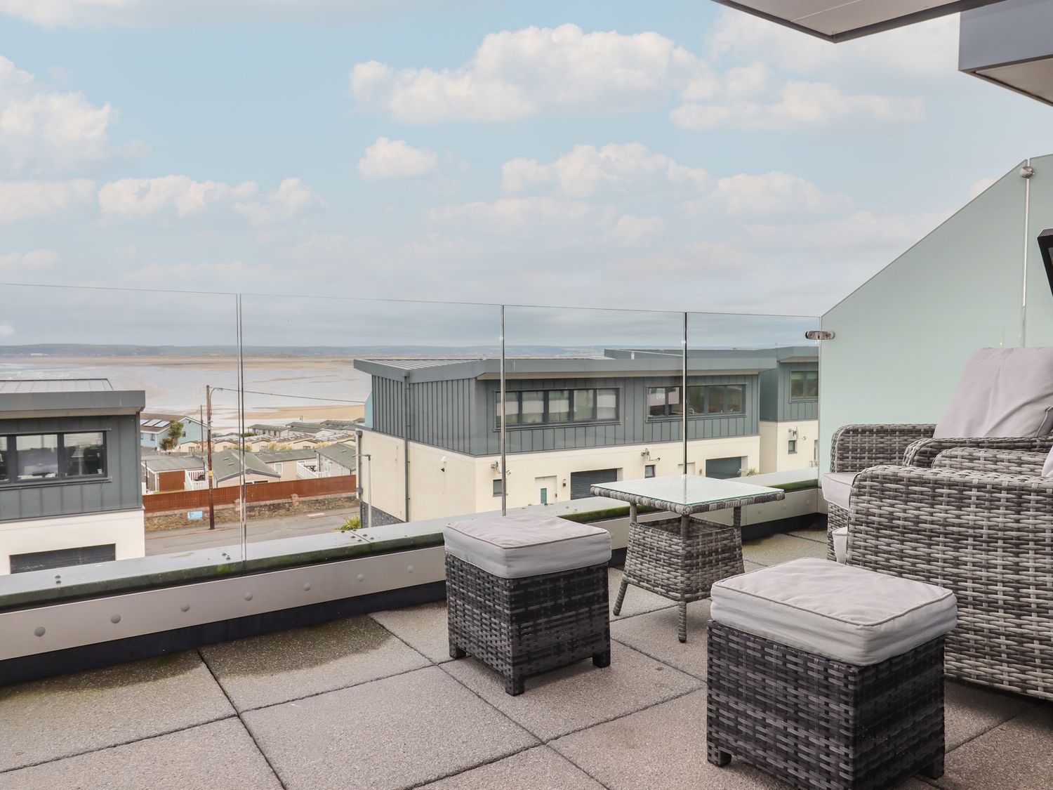 Sunset View in Westward Ho!, Devon. Five-bedroom, stylish home, with sea views. Games room. Hot tub.