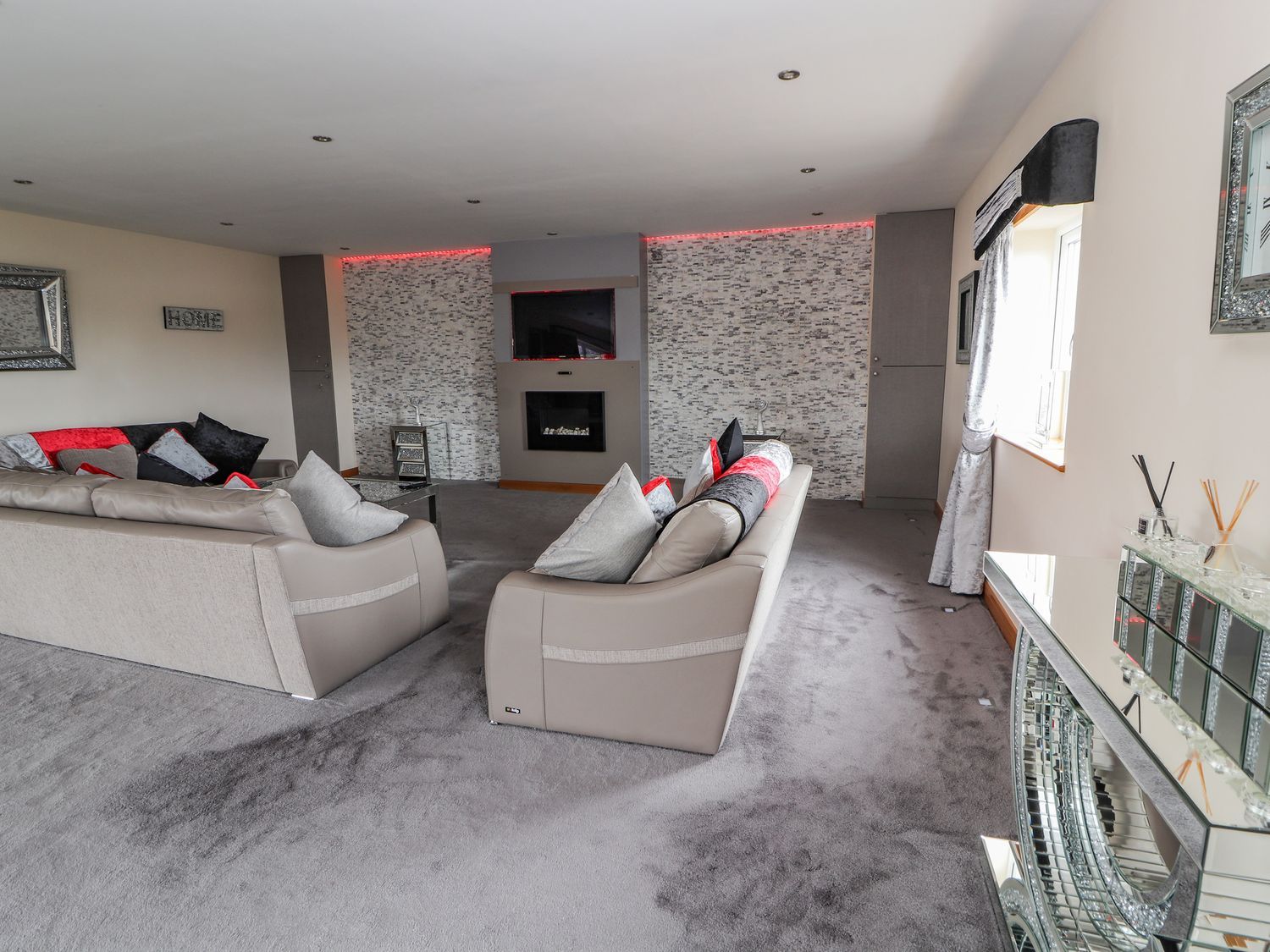 The Wendover in Towyn, Conwy. Large, coastal, duplex apartment with hot tub, games room, and terrace