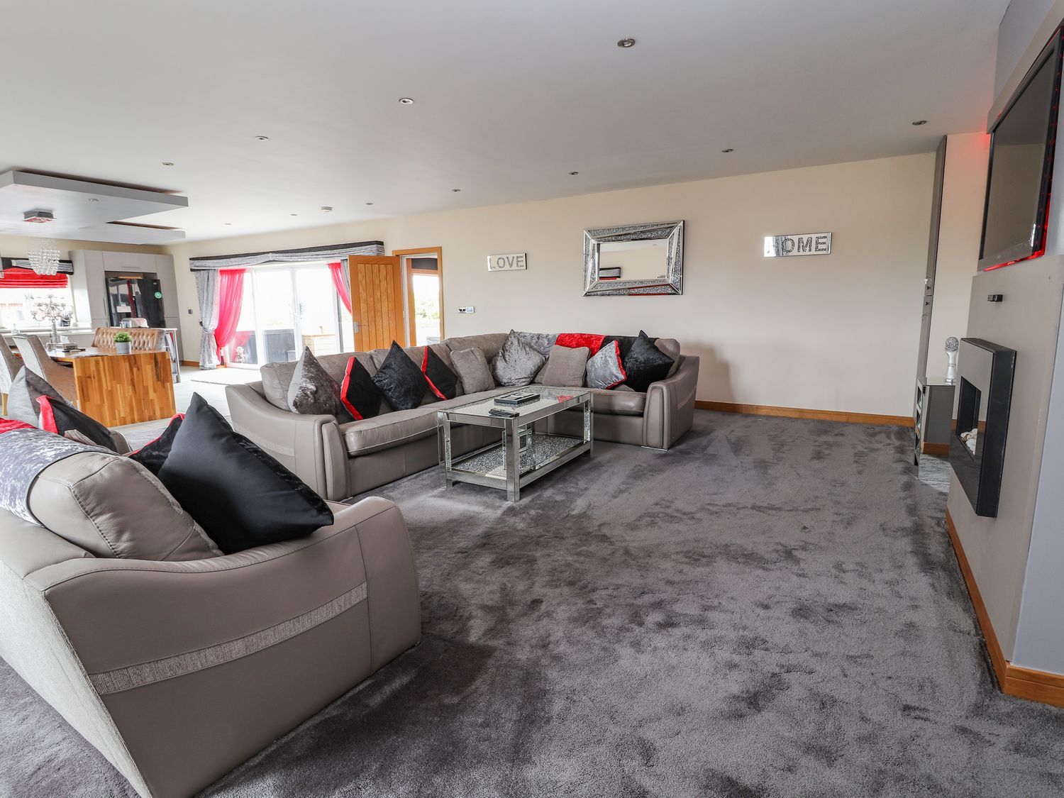 The Wendover in Towyn, Conwy. Large, coastal, duplex apartment with hot tub, games room, and terrace