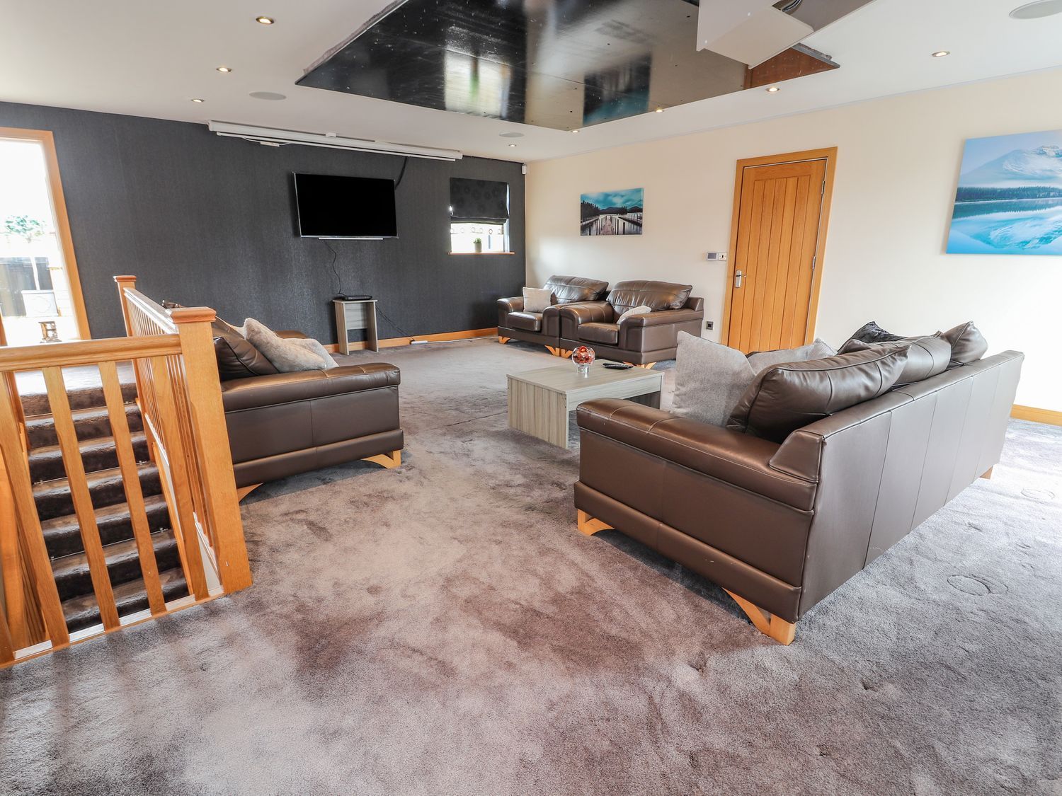 The Wendover in Towyn, Conwy. Large, coastal, duplex apartment with hot tub, games room, and terrace