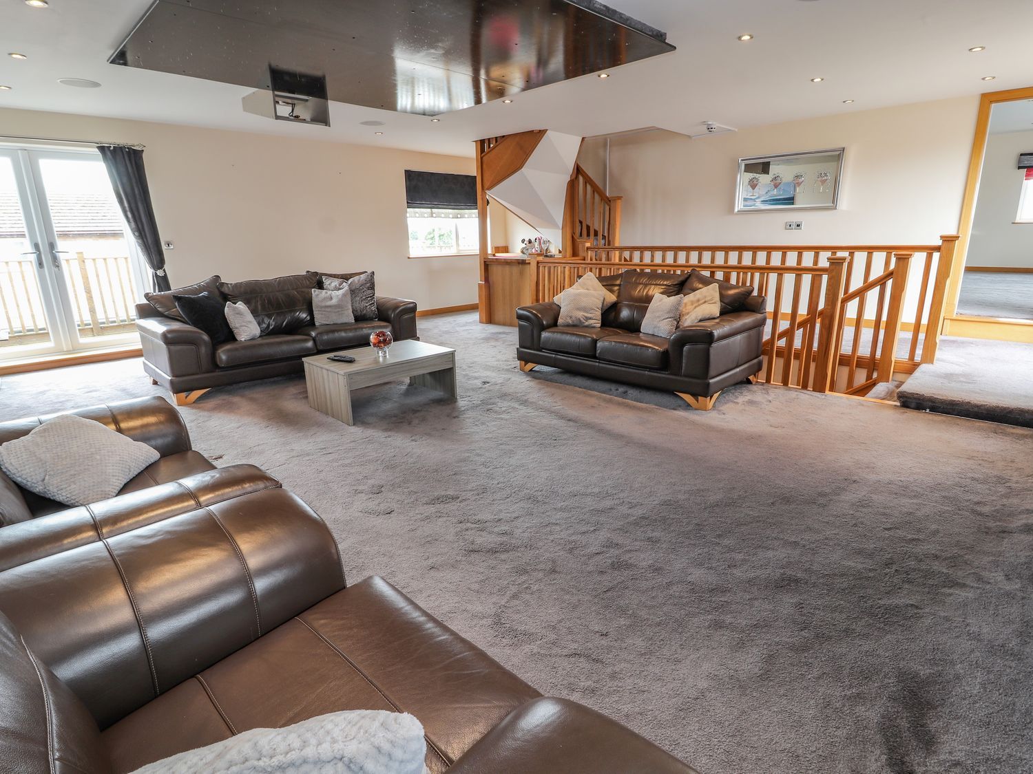 The Wendover in Towyn, Conwy. Large, coastal, duplex apartment with hot tub, games room, and terrace