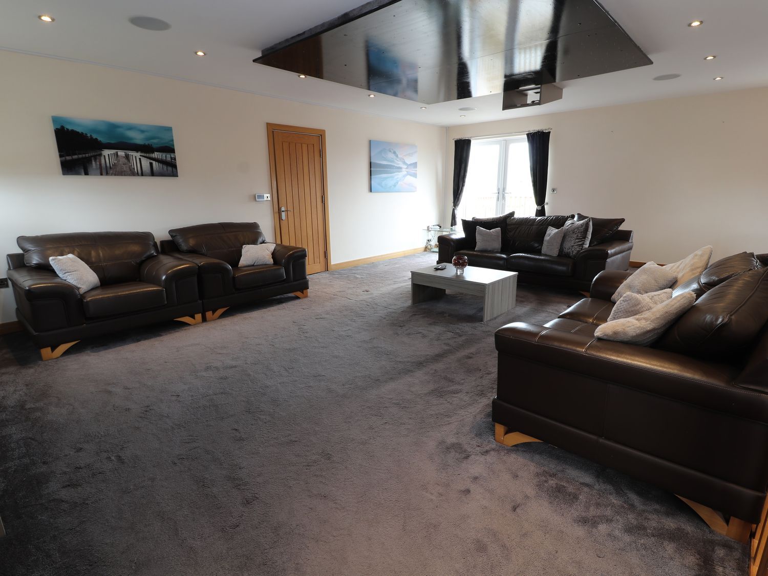 The Wendover in Towyn, Conwy. Large, coastal, duplex apartment with hot tub, games room, and terrace