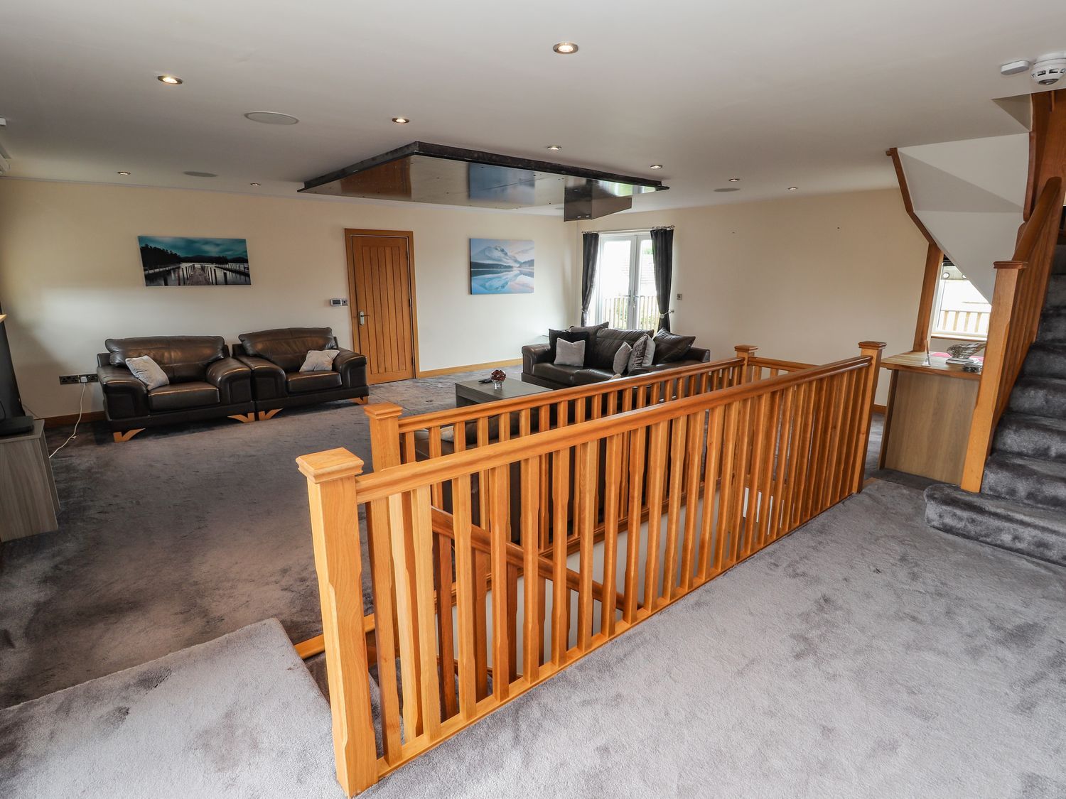 The Wendover in Towyn, Conwy. Large, coastal, duplex apartment with hot tub, games room, and terrace