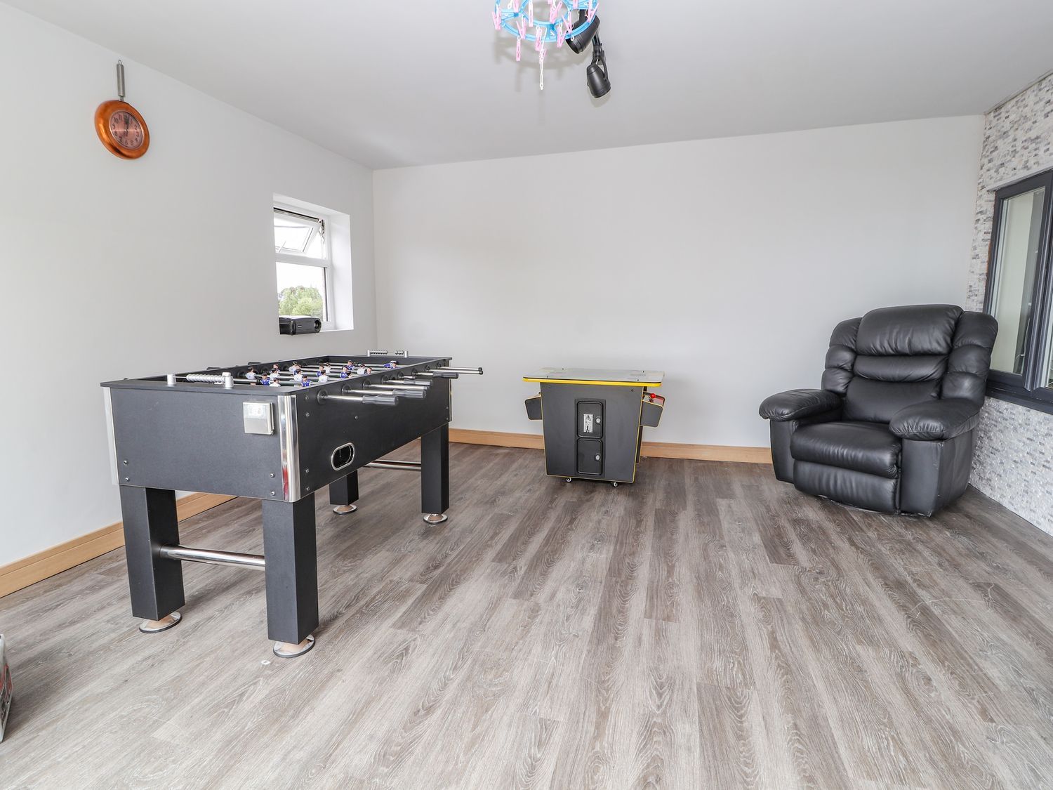 The Wendover in Towyn, Conwy. Large, coastal, duplex apartment with hot tub, games room, and terrace