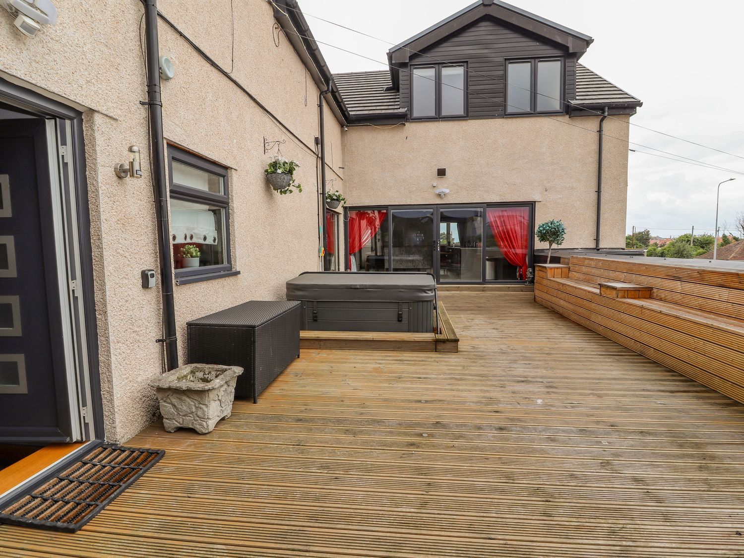 The Wendover in Towyn, Conwy. Large, coastal, duplex apartment with hot tub, games room, and terrace