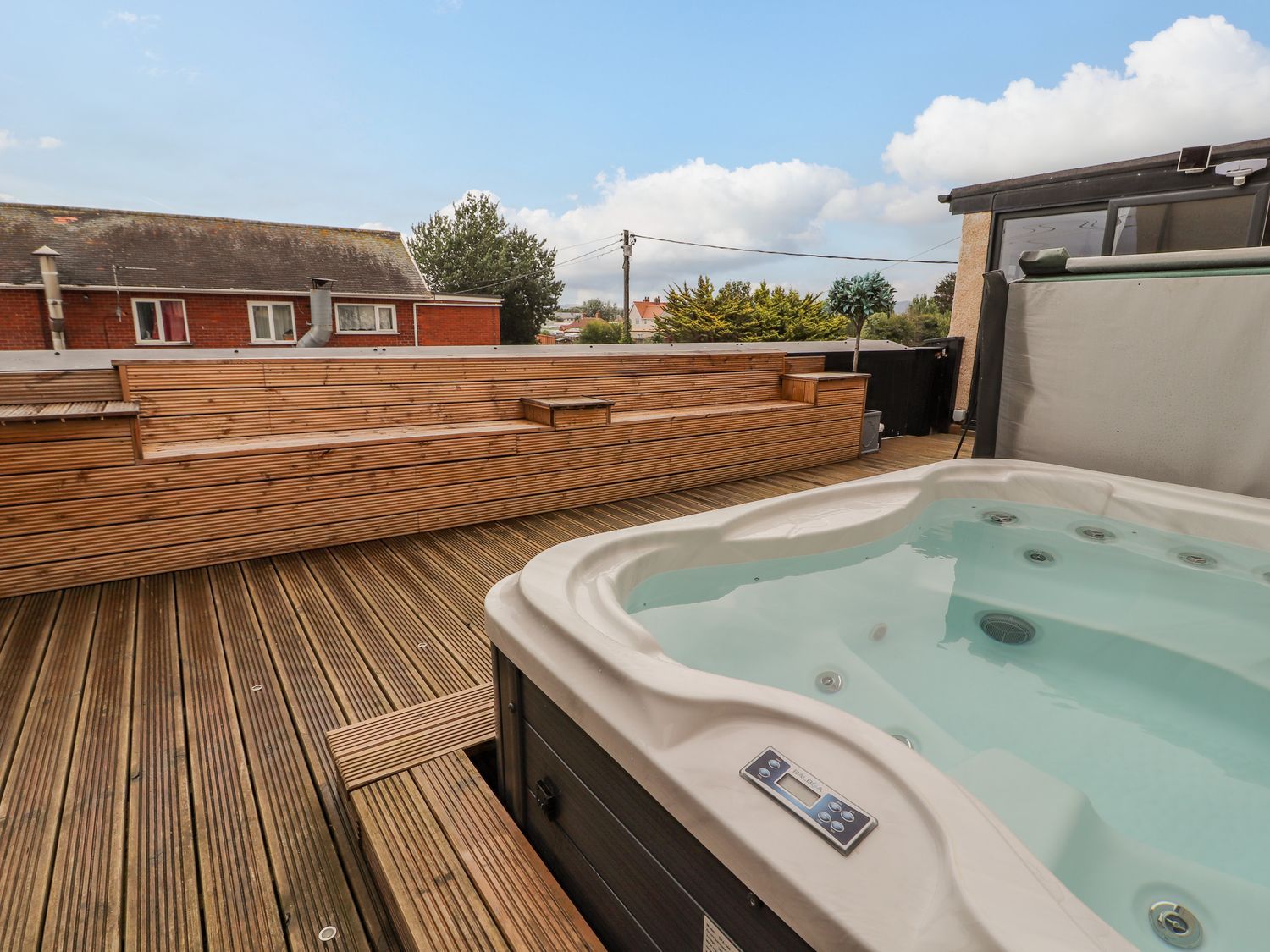 The Wendover in Towyn, Conwy. Large, coastal, duplex apartment with hot tub, games room, and terrace