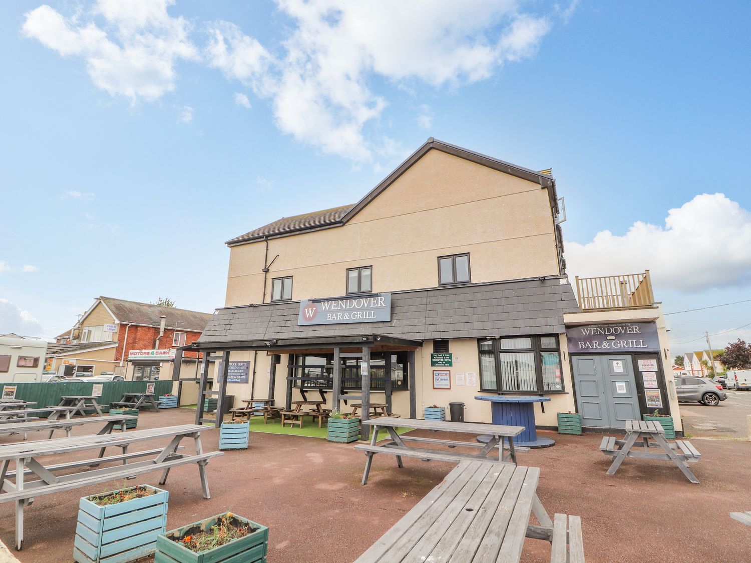 The Wendover in Towyn, Conwy. Large, coastal, duplex apartment with hot tub, games room, and terrace