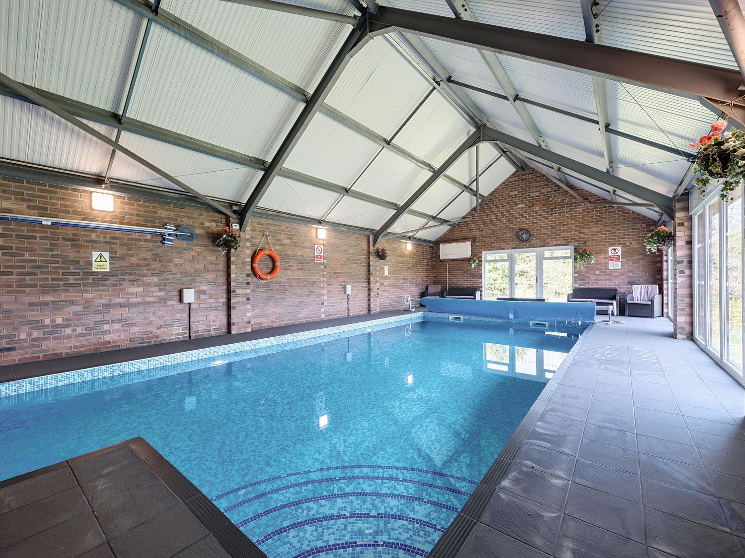 Home Farm on Llanerch Hall Estate, near St Asaph in Denbighshire. Detached. Hot tub. Gym. Games room