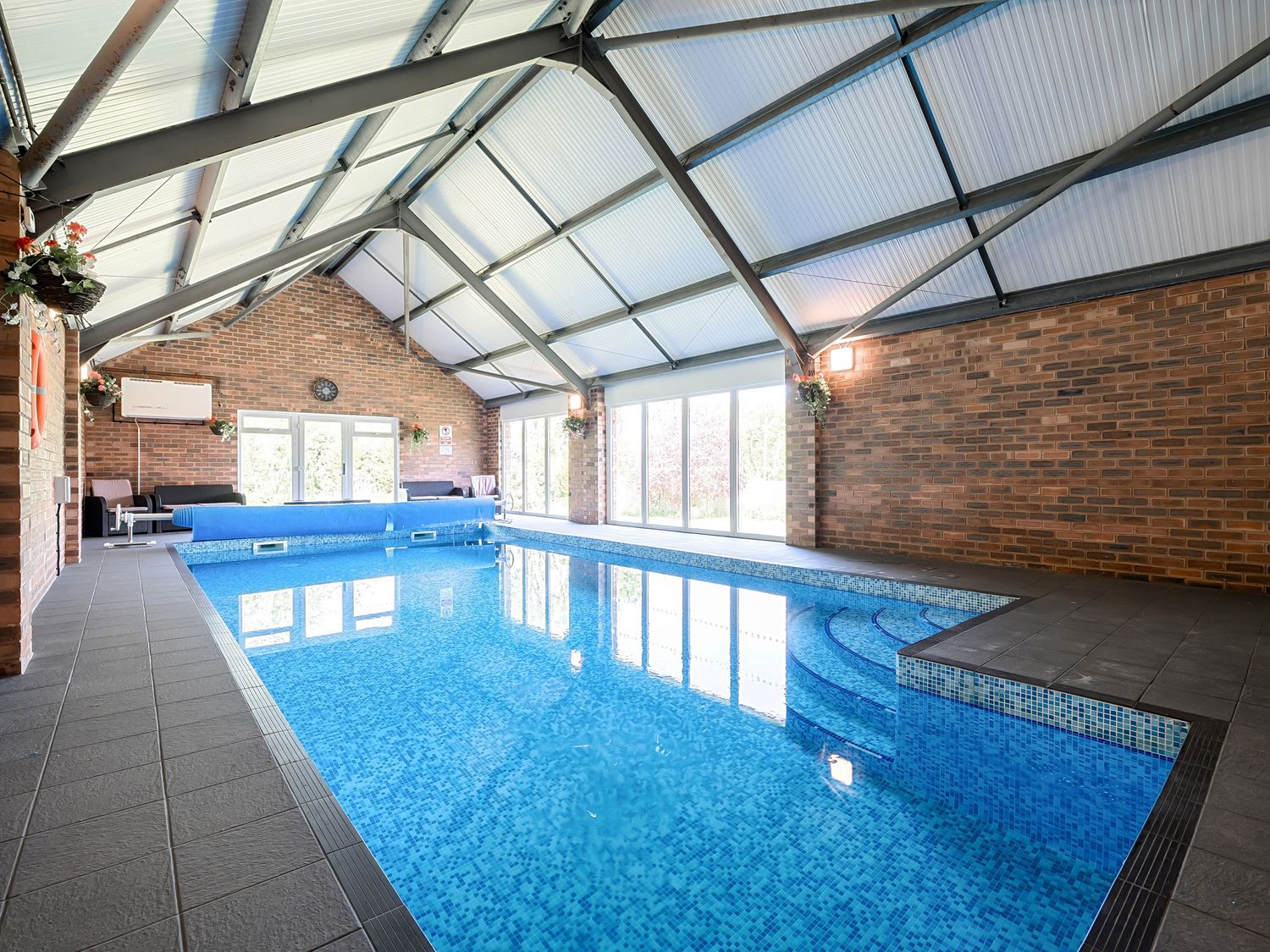 Home Farm on Llanerch Hall Estate, near St Asaph in Denbighshire. Detached. Hot tub. Gym. Games room