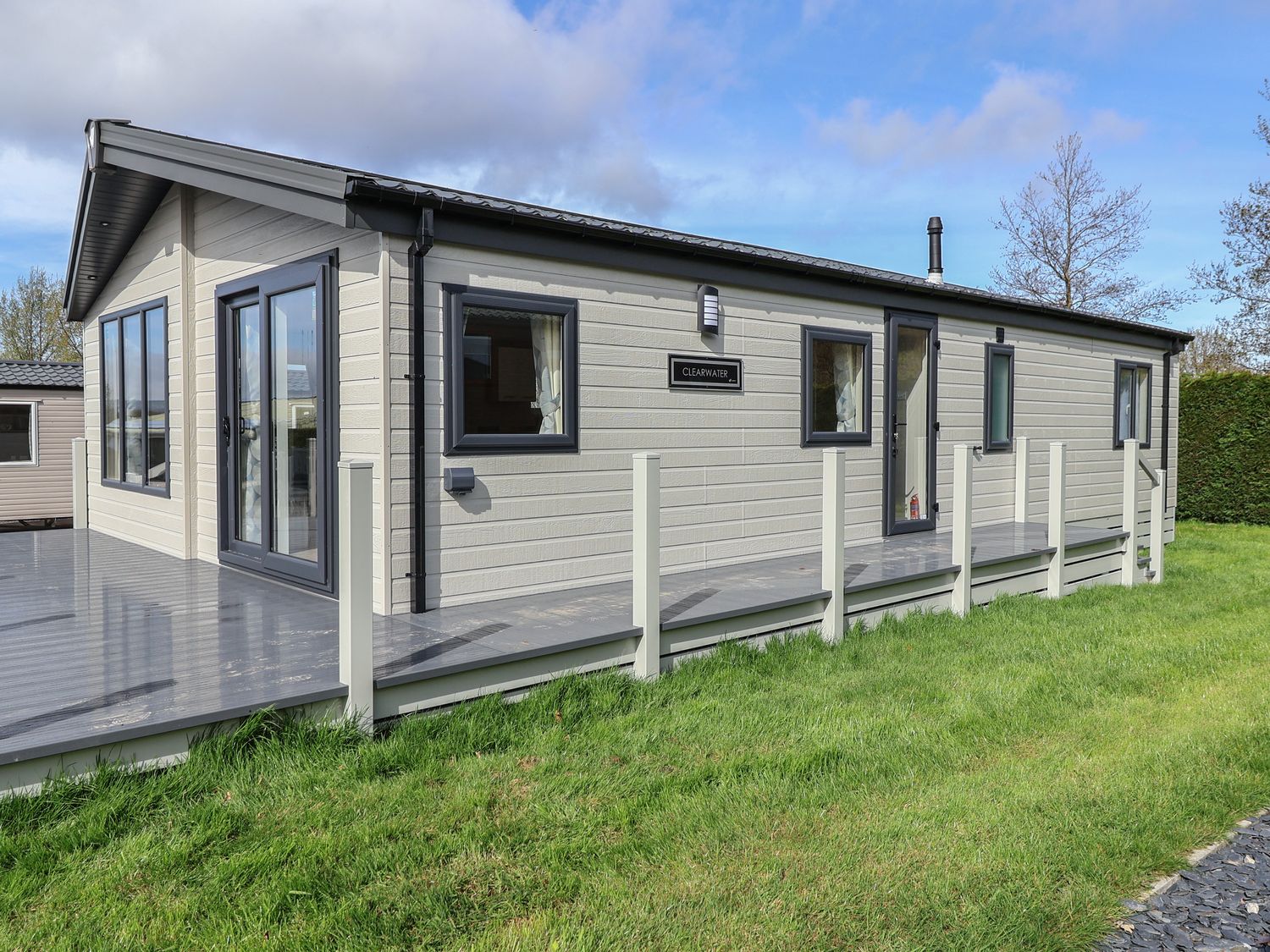 Lodge 3 in St Asaph, Denbighshire, North Wales. Single-storey. Smart TV. Decking. On-site facilities