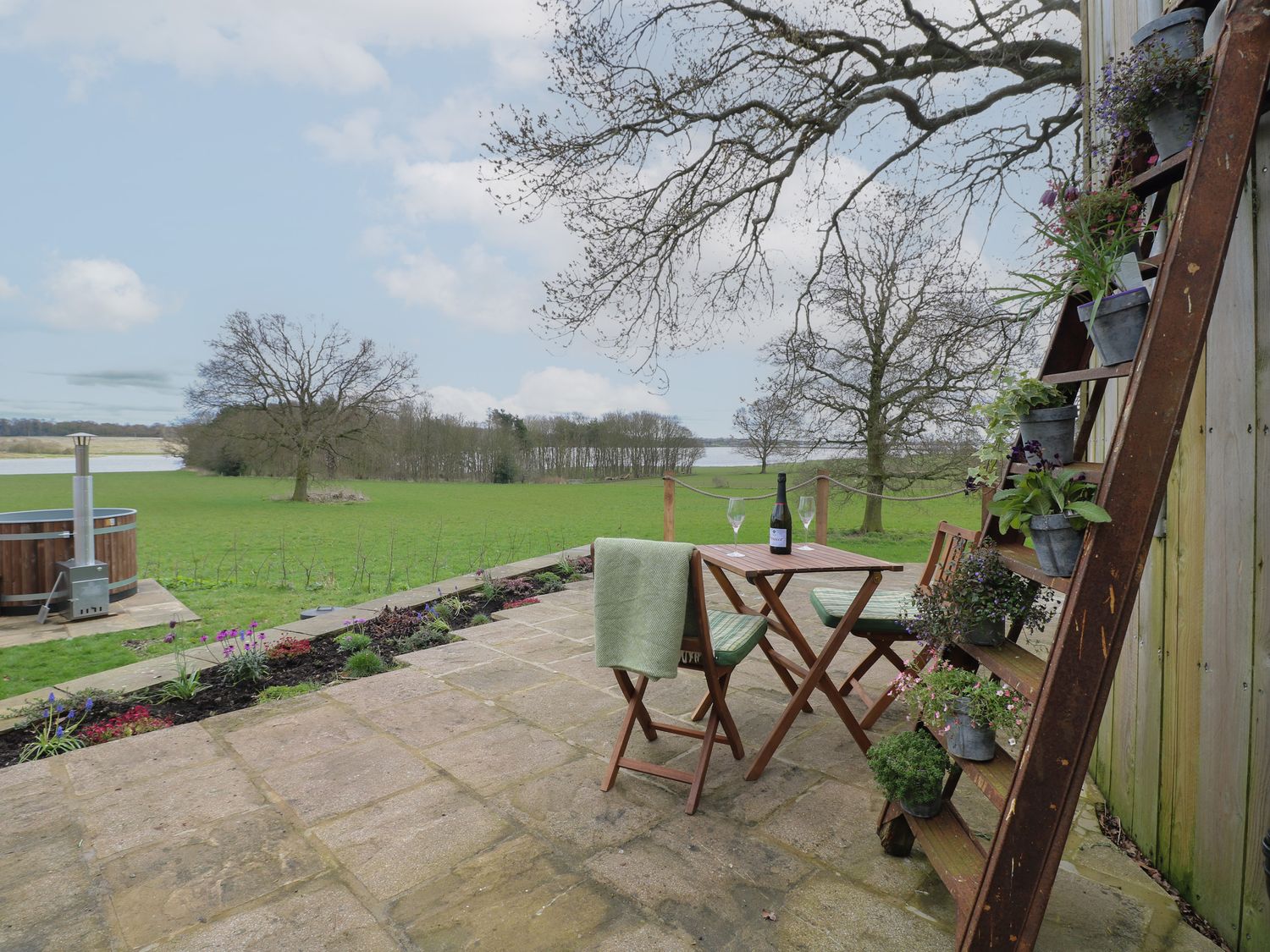 The Lazy Squire by The Water, Admaston near Rugeley, Staffordshire. Wood-fired hot tub. Countryside.