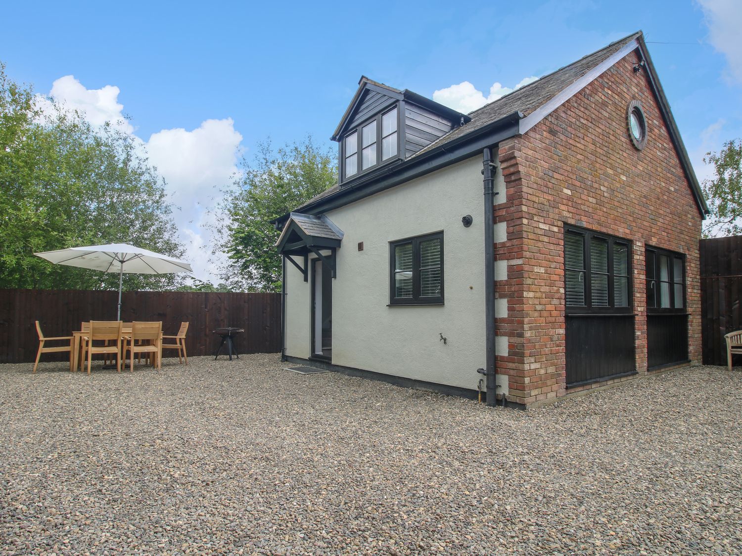 1 Clarkes Lane in St Martins, Shropshire. Woodburning stove. Games room. Hot tub. Pet-friendly. WiFi