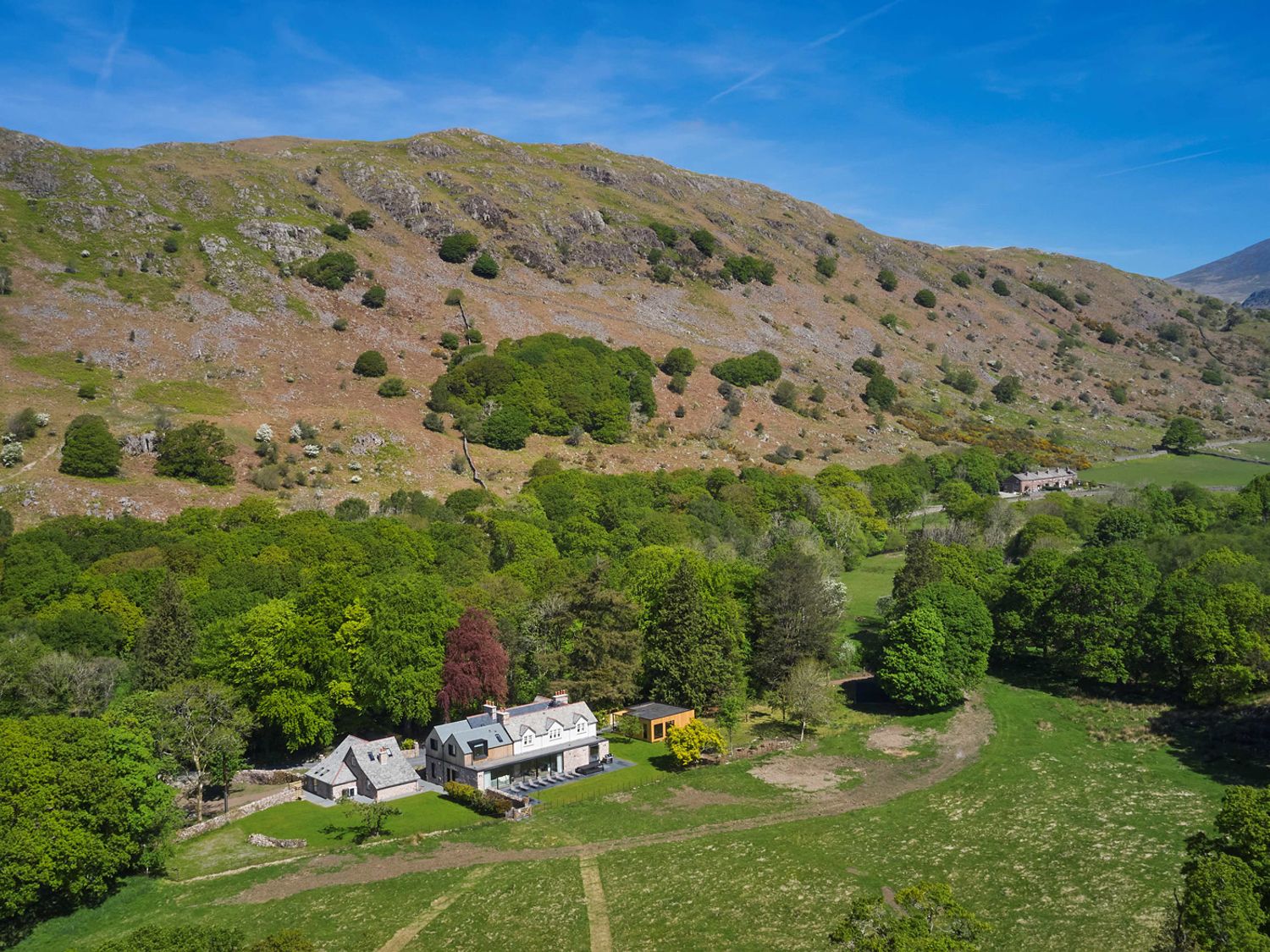 Eskdale Retreat with hot tub, amongst 10 acres of meadow and woodland in Boot, nr Holmrook, Cumbria.